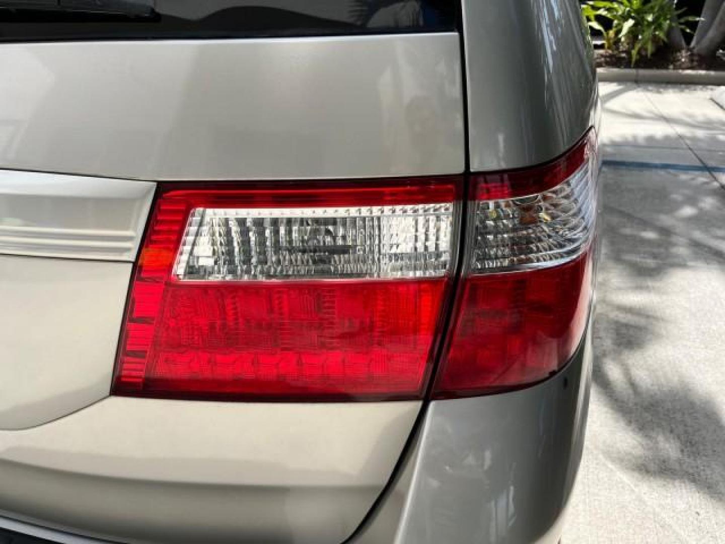 2006 Sage Brush Pearl /Gray Honda Odyssey EX-L LOW MILES 61,166 (5FNRL38696B) with an 3.5L SOHC MPFI 24-Valve i-VTEC V6 Engine engine, Automatic transmission, located at 4701 North Dixie Hwy, Pompano Beach, FL, 33064, (954) 422-2889, 26.240938, -80.123474 - OUR WEBPAGE FLORIDACARS1.COM HAS OVER 100 PHOTOS AND FREE CARFAX LINK 2006 HONDA ODYSSEY EX-L ROAD READY 3.5L V6 VIN: 5FNRL38696B408340 NO RECALLS 28 MPG VAN POWER SLIDING DOORS 3.5L V6 F SOHC 24V 3 ROW LEATHER SEATS GASOLINE LOW MILES 61,166 POWER SUNROOF/MIRRORS FRONT WHEEL DRIVE 1 OWNER 23 SERVIC - Photo#98