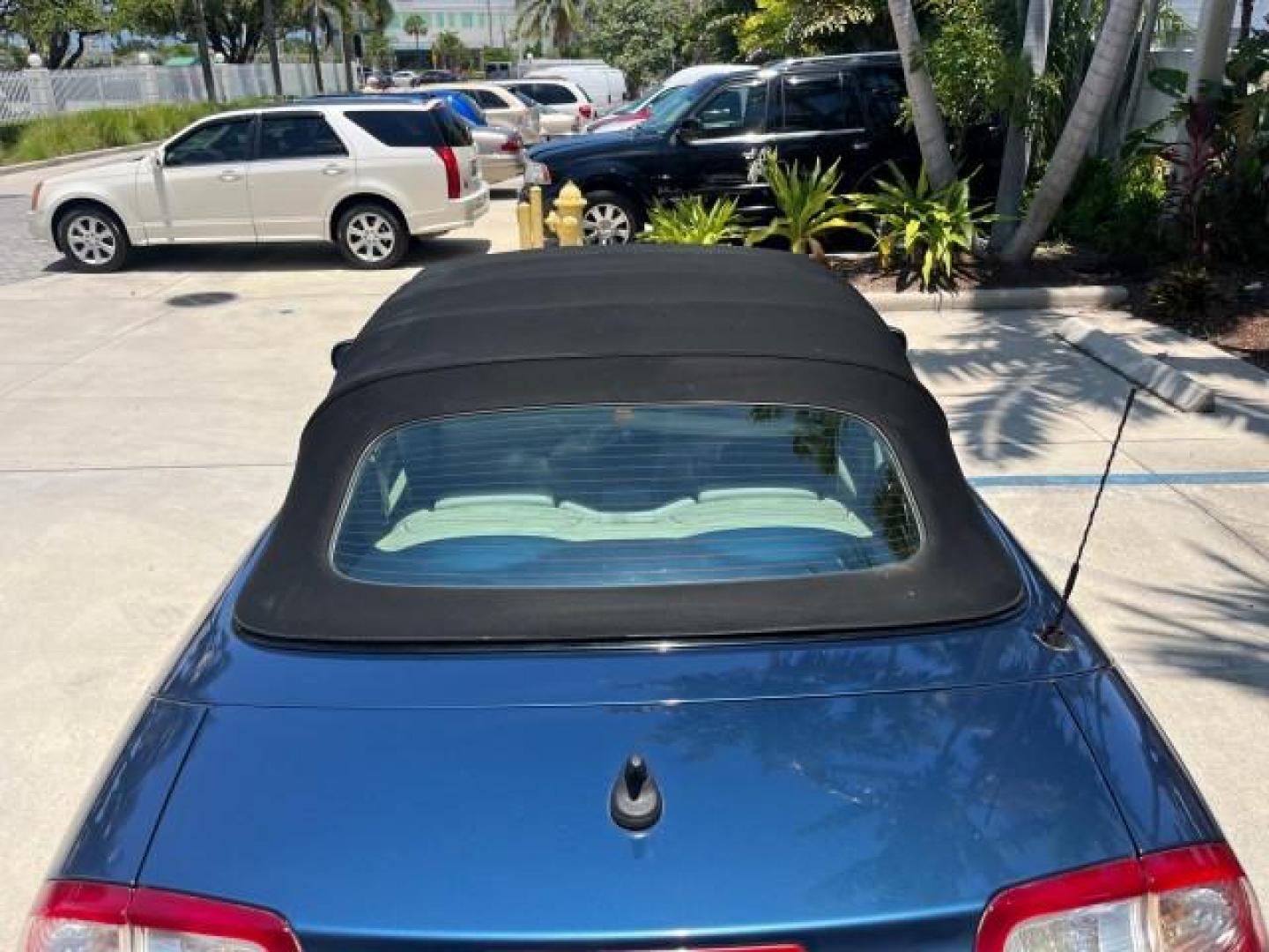 2006 Nocturne Blue Metallic /Slate Gray Saab 9-3 CONV LOW MILES 75,575 (YS3FD79Y966) with an 2.0L DOHC MPFI Turbocharged 4-Cyl Engine engine, Automatic transmission, located at 4701 North Dixie Hwy, Pompano Beach, FL, 33064, (954) 422-2889, 26.240938, -80.123474 - OUR WEBPAGE FLORIDACARS1.COM HAS OVER 100 PHOTOS AND FREE CARFAX LINK 2006 SAAB 9-3 2.0T ROAD READY 2.O L TURBO VIN: YS3FD79Y966001453 NO ACCIDENTS NO RECALLS CONVERTIBLE LOW MILES 75,575 2.0L I4 F SOHC POWER CONVERTIBLE TOP GASOLINE 29 MPG POWER LEATHER SEATS FRONT WHEEL DRIVE DUAL ZONE AC 4 SERVIC - Photo#69