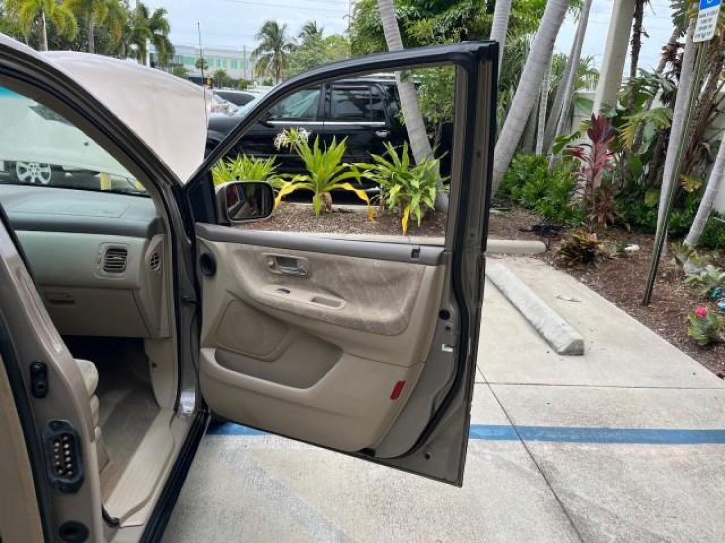 2003 Sandstone Metallic /Ivory Honda Odyssey 1 FL EX LOW MILES 65,633 (5FNRL18683B) with an 3.5L SOHC MPFI 24-Valve VTEC V6 Engine engine, Automatic transmission, located at 4701 North Dixie Hwy, Pompano Beach, FL, 33064, (954) 422-2889, 26.240938, -80.123474 - OUR WEBPAGE FLORIDACARS1.COM HAS OVER 100 PHOTOS AND FREE CARFAX LINK 2003 HONDA ODYSSEY EX ROAD READY 3.5L V6 VIN: 5FNRL18683B006146 NO ACCIDENTS VAN NO RECALLS 3.5L V6 F SOHC 16 SERVICE RECORDS LOW MILES 65,633 GASOLINE POWER SEATS/MIRRORS POWER SLIDING DOORS FRONT WHEEL DRIVE 3 ROW SEATS 1 OWNER - Photo#11