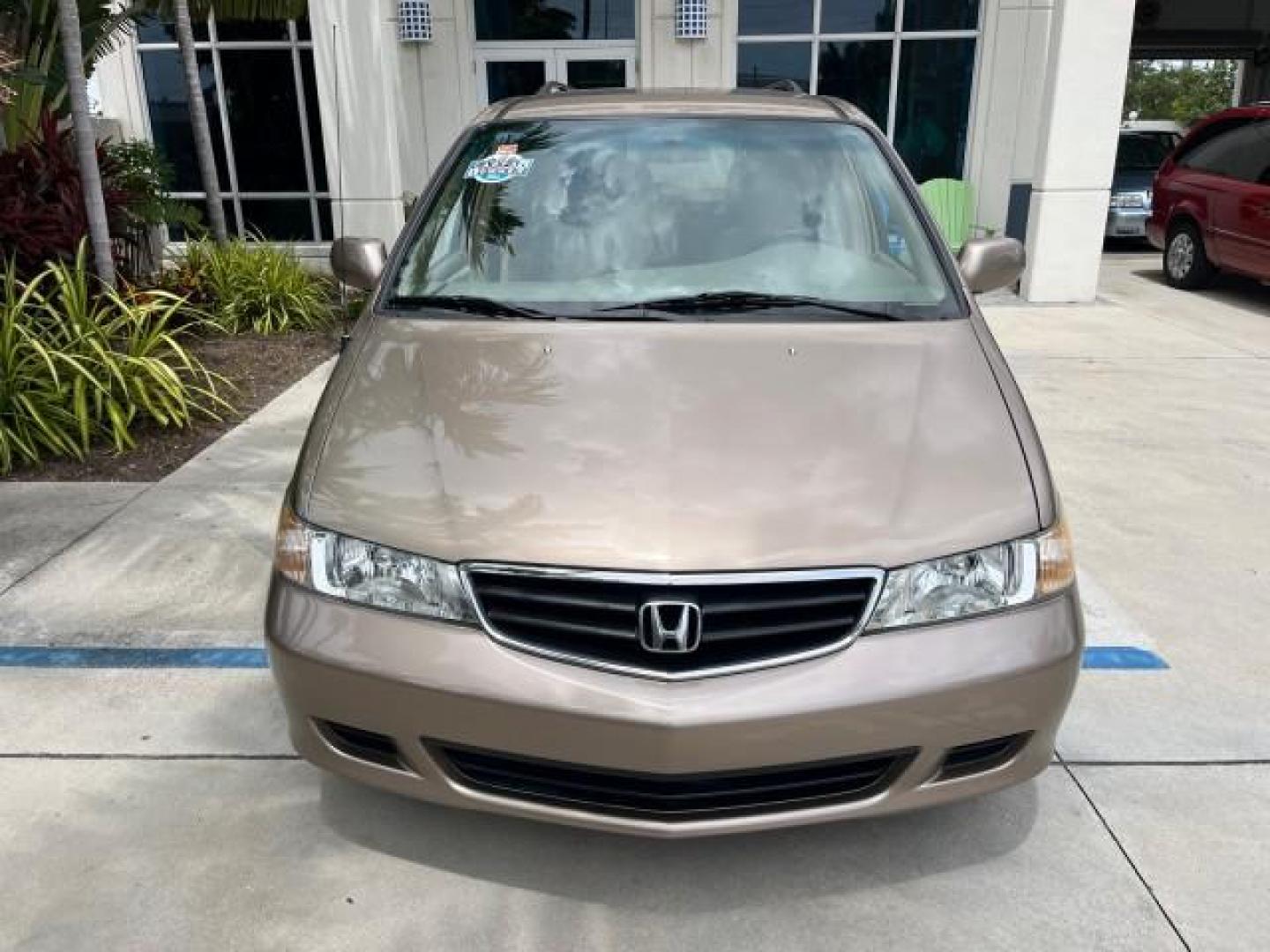 2003 Sandstone Metallic /Ivory Honda Odyssey 1 FL EX LOW MILES 65,633 (5FNRL18683B) with an 3.5L SOHC MPFI 24-Valve VTEC V6 Engine engine, Automatic transmission, located at 4701 North Dixie Hwy, Pompano Beach, FL, 33064, (954) 422-2889, 26.240938, -80.123474 - OUR WEBPAGE FLORIDACARS1.COM HAS OVER 100 PHOTOS AND FREE CARFAX LINK 2003 HONDA ODYSSEY EX ROAD READY 3.5L V6 VIN: 5FNRL18683B006146 NO ACCIDENTS VAN NO RECALLS 3.5L V6 F SOHC 16 SERVICE RECORDS LOW MILES 65,633 GASOLINE POWER SEATS/MIRRORS POWER SLIDING DOORS FRONT WHEEL DRIVE 3 ROW SEATS 1 OWNER - Photo#80