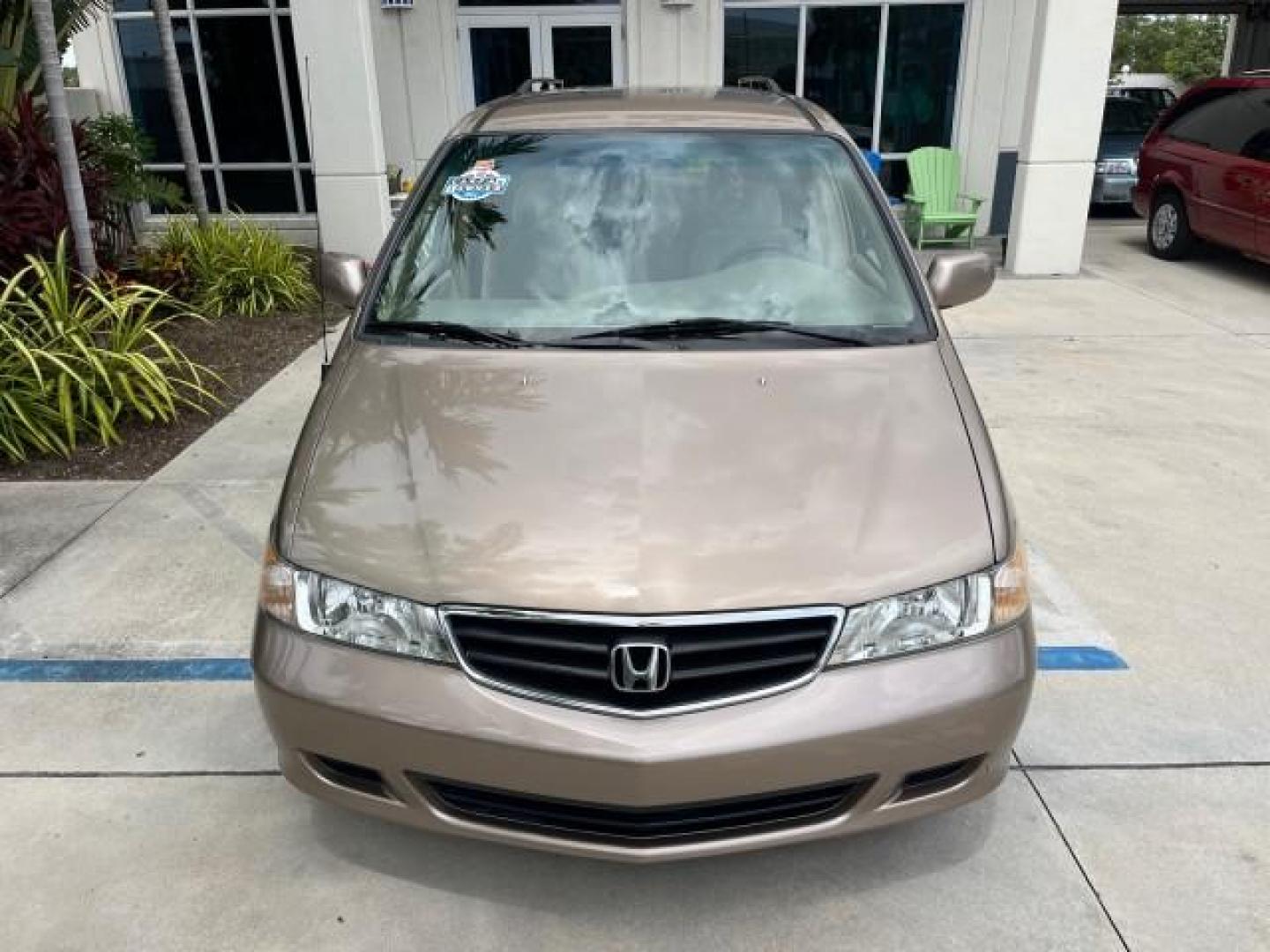 2003 Sandstone Metallic /Ivory Honda Odyssey 1 FL EX LOW MILES 65,633 (5FNRL18683B) with an 3.5L SOHC MPFI 24-Valve VTEC V6 Engine engine, Automatic transmission, located at 4701 North Dixie Hwy, Pompano Beach, FL, 33064, (954) 422-2889, 26.240938, -80.123474 - OUR WEBPAGE FLORIDACARS1.COM HAS OVER 100 PHOTOS AND FREE CARFAX LINK 2003 HONDA ODYSSEY EX ROAD READY 3.5L V6 VIN: 5FNRL18683B006146 NO ACCIDENTS VAN NO RECALLS 3.5L V6 F SOHC 16 SERVICE RECORDS LOW MILES 65,633 GASOLINE POWER SEATS/MIRRORS POWER SLIDING DOORS FRONT WHEEL DRIVE 3 ROW SEATS 1 OWNER - Photo#87