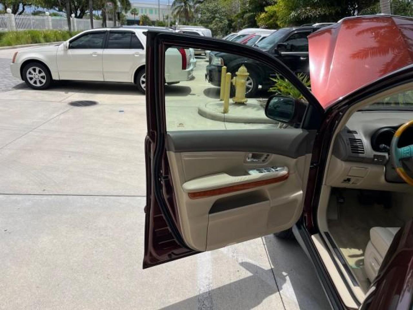 2008 Brandy Wine Mica /Lt Gray/Black Lexus RX 350 AWD LOW MILES 81,974 (JTJHK31U382) with an 3.5L DOHC SFI 24-Valve V6 Engine engine, Automatic transmission, located at 4701 North Dixie Hwy, Pompano Beach, FL, 33064, (954) 422-2889, 26.240938, -80.123474 - OUR WEBPAGE FLORIDACARS1.COM HAS OVER 100 PHOTOS AND FREE CARFAX LINK 2008 LEXUS RX 350 NEW $53,585 ROAD READY 3.5L V6 VIN: JTJHK31U382042868 NO ACCIDENTS NO RECALLS 4 DOOR WAGON/SPORT UTILITY 32 SERVICE RECORDS 3.5L V6 F DOHC 24V ALL WHEEL DRIVE ON DEMAND GASOLINE LOW MILES 81,974 POWER LEATHER SEA - Photo#9