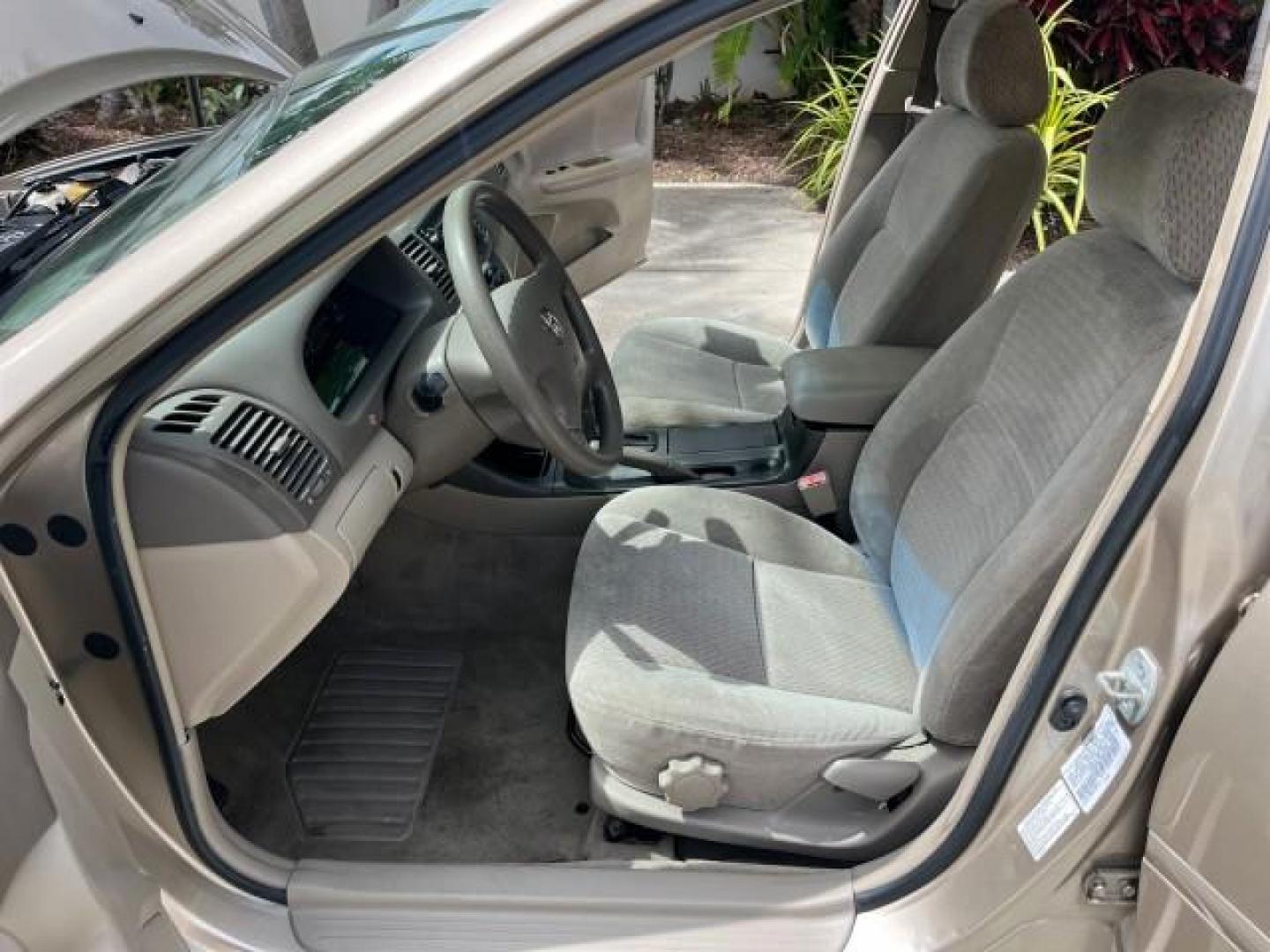 2003 Desert Sand Mica /Stone Toyota Camry 1 OWNER LE LOW MILES 57,114 (4T1BE32K73U) with an 2.4L DOHC Vvti 16-Valve 4-Cyl Engine engine, Automatic transmission, located at 4701 North Dixie Hwy, Pompano Beach, FL, 33064, (954) 422-2889, 26.240938, -80.123474 - OUR WEBPAGE FLORIDACARS1.COM HAS OVER 100 PHOTOS AND FREE CARFAX LINK 2003 TOYOTA CAMRY LE ROAD READY 2.4L I4 VIN: 4T1BE32K73U646722 NO RECALLS 32 MPG SEDAN 4 DR 1 OWNER 2.4L I4 F DOHC 16V LOW MILES 57,114 GASOLINE 7 SERVICE RECORDS FRONT WHEEL DRIVE POWER MIRRORS Approach Lights Cruise Control FWD - Photo#10