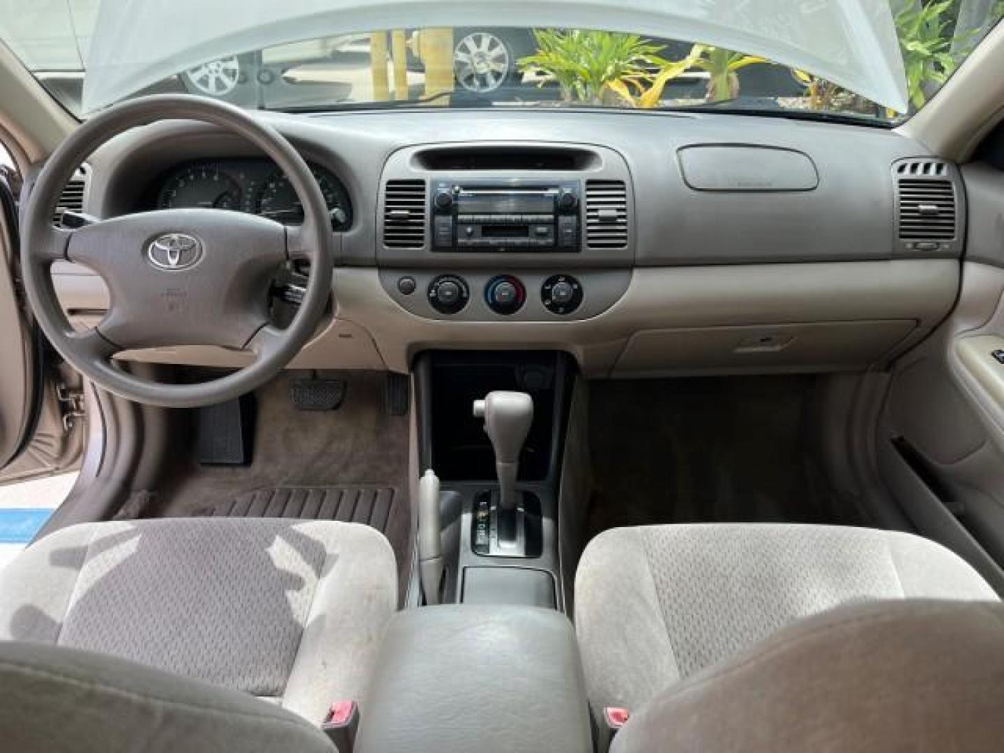 2003 Desert Sand Mica /Stone Toyota Camry 1 OWNER LE LOW MILES 57,114 (4T1BE32K73U) with an 2.4L DOHC Vvti 16-Valve 4-Cyl Engine engine, Automatic transmission, located at 4701 North Dixie Hwy, Pompano Beach, FL, 33064, (954) 422-2889, 26.240938, -80.123474 - OUR WEBPAGE FLORIDACARS1.COM HAS OVER 100 PHOTOS AND FREE CARFAX LINK 2003 TOYOTA CAMRY LE ROAD READY 2.4L I4 VIN: 4T1BE32K73U646722 NO RECALLS 32 MPG SEDAN 4 DR 1 OWNER 2.4L I4 F DOHC 16V LOW MILES 57,114 GASOLINE 7 SERVICE RECORDS FRONT WHEEL DRIVE POWER MIRRORS Approach Lights Cruise Control FWD - Photo#33