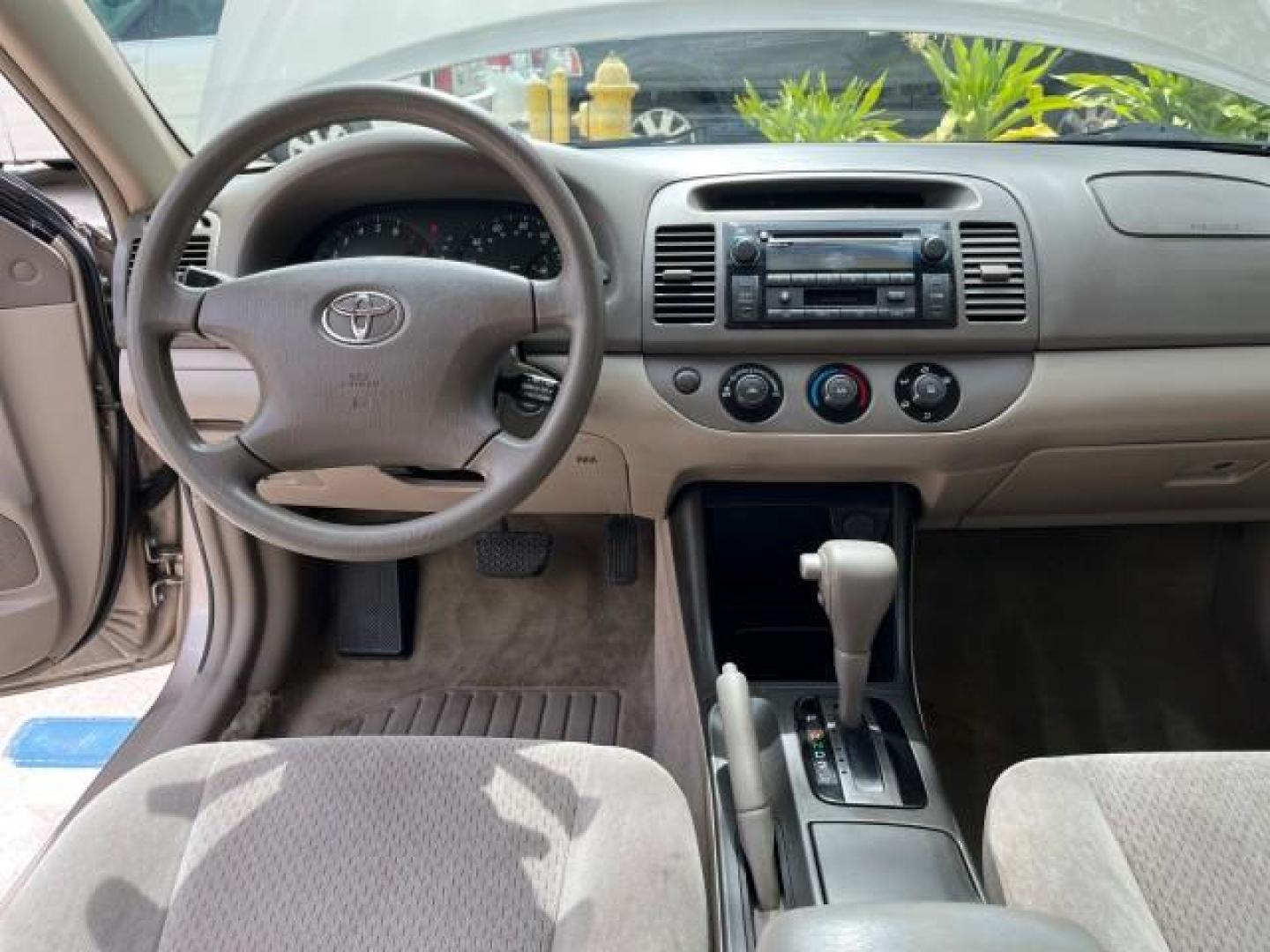 2003 Desert Sand Mica /Stone Toyota Camry 1 OWNER LE LOW MILES 57,114 (4T1BE32K73U) with an 2.4L DOHC Vvti 16-Valve 4-Cyl Engine engine, Automatic transmission, located at 4701 North Dixie Hwy, Pompano Beach, FL, 33064, (954) 422-2889, 26.240938, -80.123474 - OUR WEBPAGE FLORIDACARS1.COM HAS OVER 100 PHOTOS AND FREE CARFAX LINK 2003 TOYOTA CAMRY LE ROAD READY 2.4L I4 VIN: 4T1BE32K73U646722 NO RECALLS 32 MPG SEDAN 4 DR 1 OWNER 2.4L I4 F DOHC 16V LOW MILES 57,114 GASOLINE 7 SERVICE RECORDS FRONT WHEEL DRIVE POWER MIRRORS Approach Lights Cruise Control FWD - Photo#34