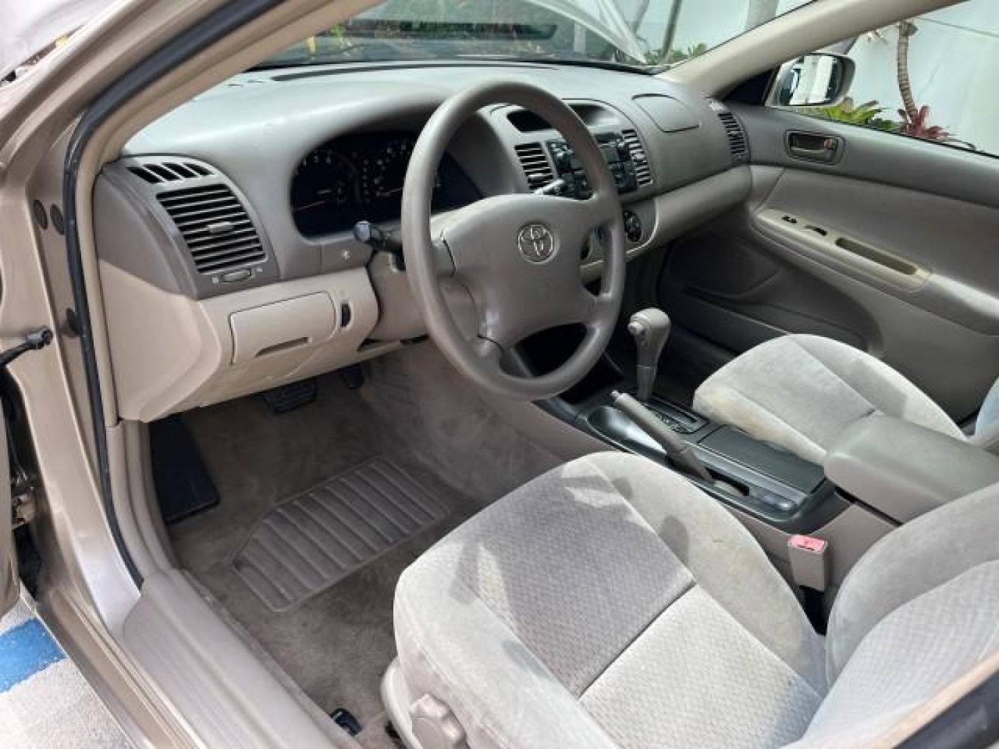 2003 Desert Sand Mica /Stone Toyota Camry 1 OWNER LE LOW MILES 57,114 (4T1BE32K73U) with an 2.4L DOHC Vvti 16-Valve 4-Cyl Engine engine, Automatic transmission, located at 4701 North Dixie Hwy, Pompano Beach, FL, 33064, (954) 422-2889, 26.240938, -80.123474 - OUR WEBPAGE FLORIDACARS1.COM HAS OVER 100 PHOTOS AND FREE CARFAX LINK 2003 TOYOTA CAMRY LE ROAD READY 2.4L I4 VIN: 4T1BE32K73U646722 NO RECALLS 32 MPG SEDAN 4 DR 1 OWNER 2.4L I4 F DOHC 16V LOW MILES 57,114 GASOLINE 7 SERVICE RECORDS FRONT WHEEL DRIVE POWER MIRRORS Approach Lights Cruise Control FWD - Photo#42