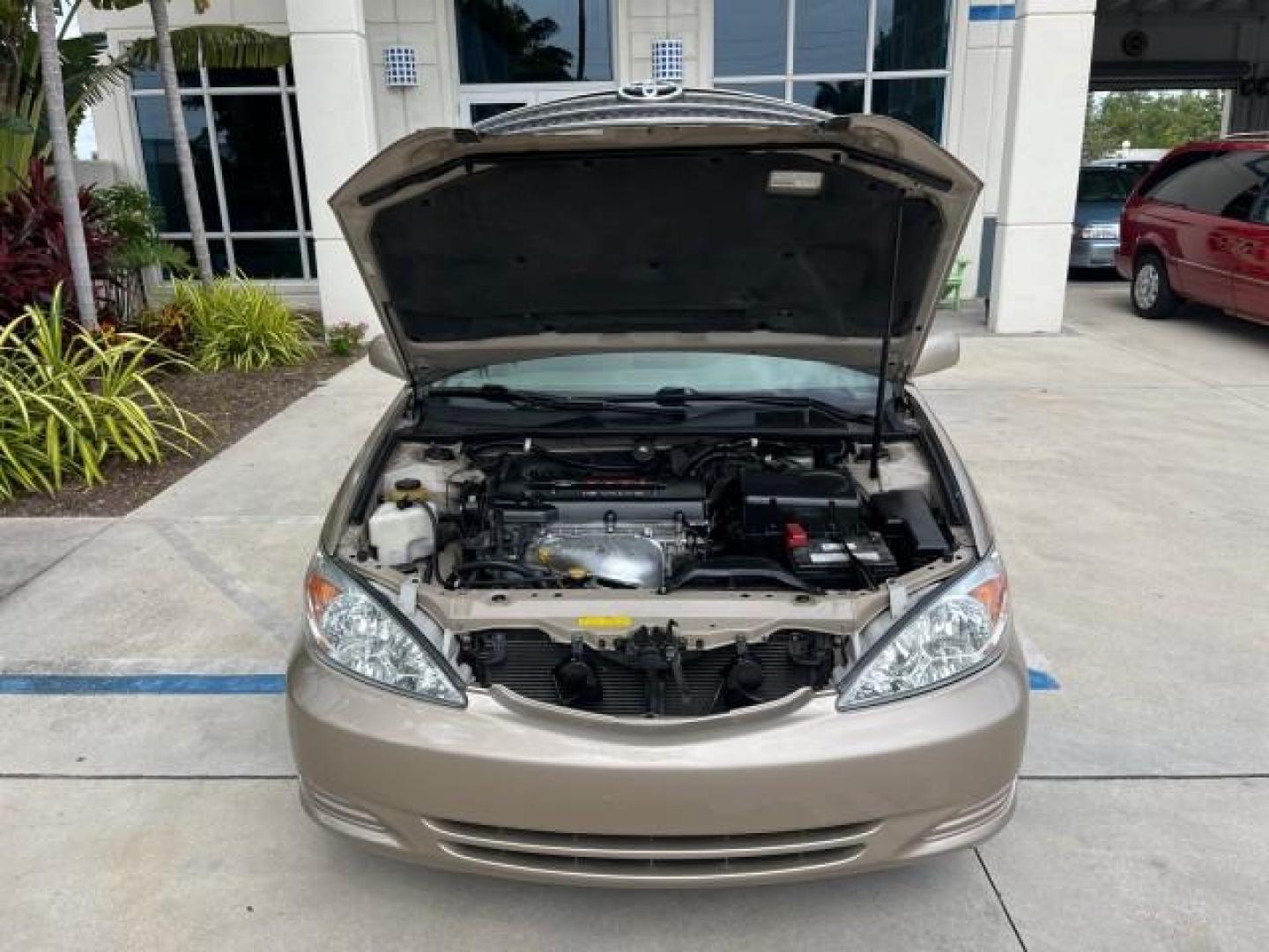 2003 Desert Sand Mica /Stone Toyota Camry 1 OWNER LE LOW MILES 57,114 (4T1BE32K73U) with an 2.4L DOHC Vvti 16-Valve 4-Cyl Engine engine, Automatic transmission, located at 4701 North Dixie Hwy, Pompano Beach, FL, 33064, (954) 422-2889, 26.240938, -80.123474 - OUR WEBPAGE FLORIDACARS1.COM HAS OVER 100 PHOTOS AND FREE CARFAX LINK 2003 TOYOTA CAMRY LE ROAD READY 2.4L I4 VIN: 4T1BE32K73U646722 NO RECALLS 32 MPG SEDAN 4 DR 1 OWNER 2.4L I4 F DOHC 16V LOW MILES 57,114 GASOLINE 7 SERVICE RECORDS FRONT WHEEL DRIVE POWER MIRRORS Approach Lights Cruise Control FWD - Photo#67