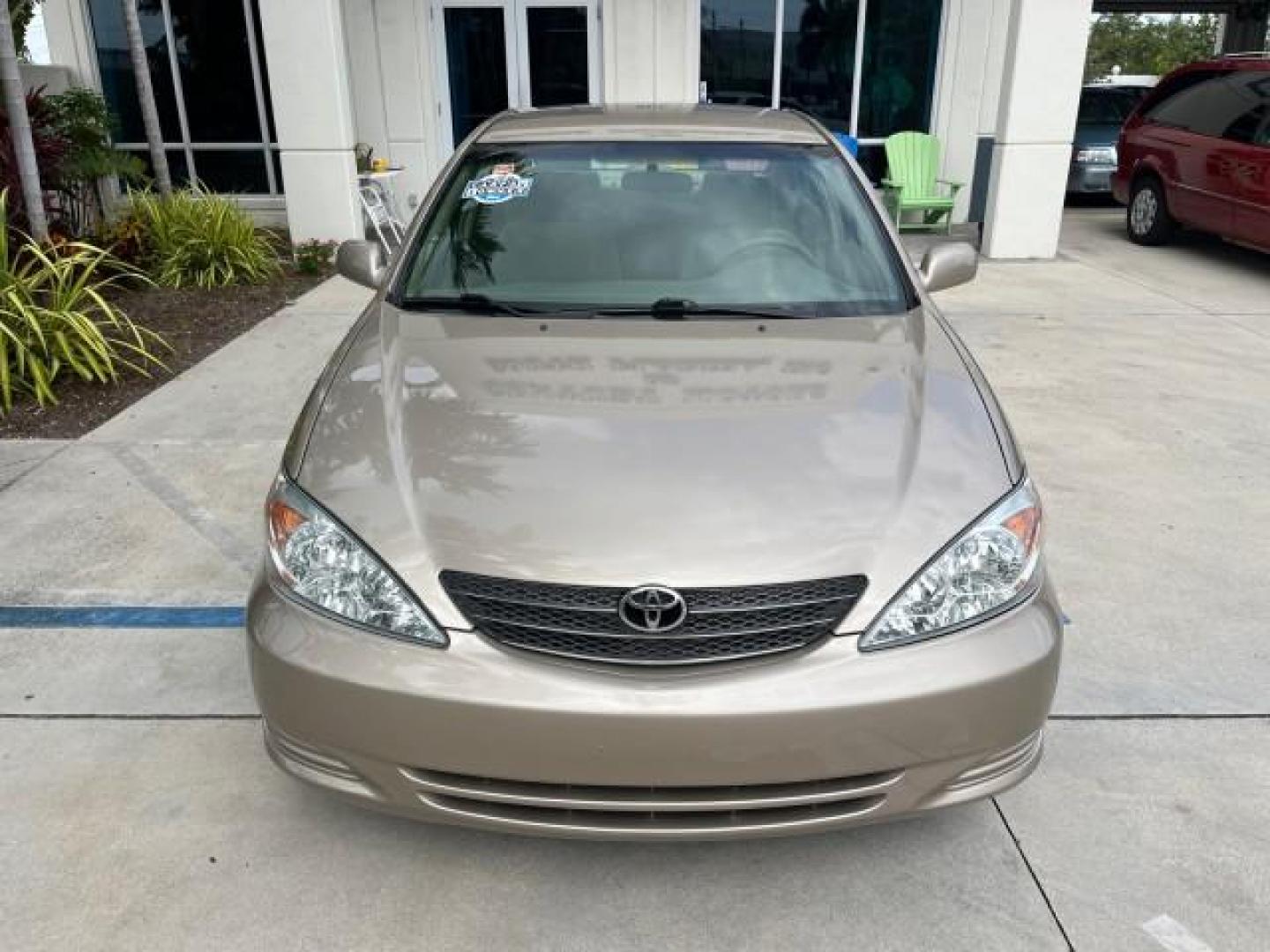 2003 Desert Sand Mica /Stone Toyota Camry 1 OWNER LE LOW MILES 57,114 (4T1BE32K73U) with an 2.4L DOHC Vvti 16-Valve 4-Cyl Engine engine, Automatic transmission, located at 4701 North Dixie Hwy, Pompano Beach, FL, 33064, (954) 422-2889, 26.240938, -80.123474 - OUR WEBPAGE FLORIDACARS1.COM HAS OVER 100 PHOTOS AND FREE CARFAX LINK 2003 TOYOTA CAMRY LE ROAD READY 2.4L I4 VIN: 4T1BE32K73U646722 NO RECALLS 32 MPG SEDAN 4 DR 1 OWNER 2.4L I4 F DOHC 16V LOW MILES 57,114 GASOLINE 7 SERVICE RECORDS FRONT WHEEL DRIVE POWER MIRRORS Approach Lights Cruise Control FWD - Photo#71