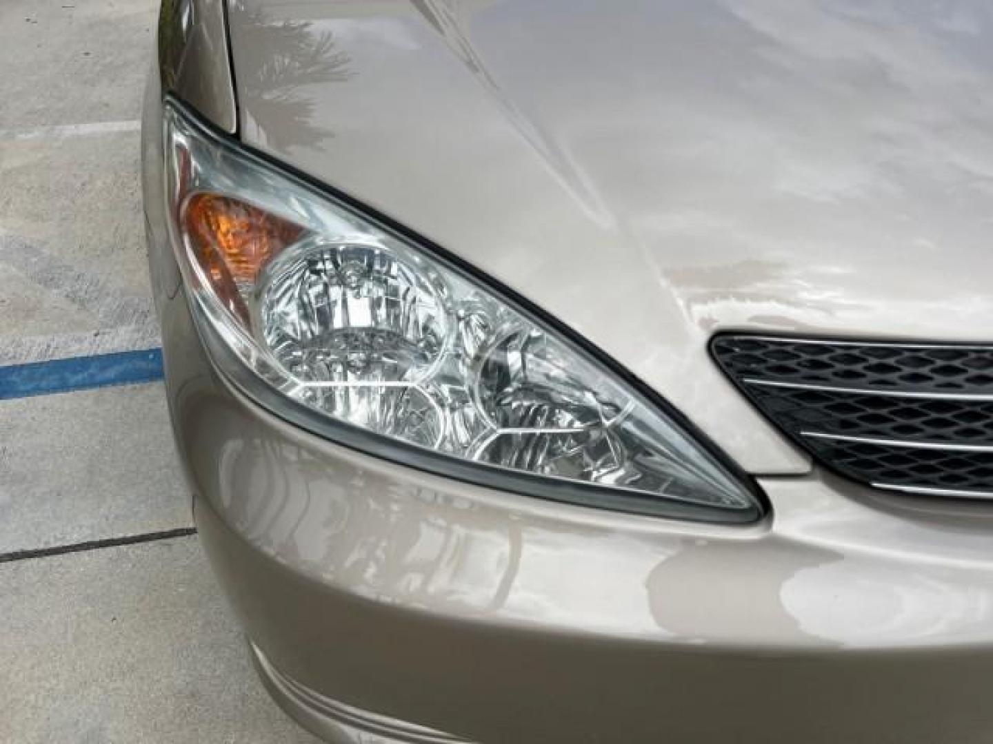 2003 Desert Sand Mica /Stone Toyota Camry 1 OWNER LE LOW MILES 57,114 (4T1BE32K73U) with an 2.4L DOHC Vvti 16-Valve 4-Cyl Engine engine, Automatic transmission, located at 4701 North Dixie Hwy, Pompano Beach, FL, 33064, (954) 422-2889, 26.240938, -80.123474 - OUR WEBPAGE FLORIDACARS1.COM HAS OVER 100 PHOTOS AND FREE CARFAX LINK 2003 TOYOTA CAMRY LE ROAD READY 2.4L I4 VIN: 4T1BE32K73U646722 NO RECALLS 32 MPG SEDAN 4 DR 1 OWNER 2.4L I4 F DOHC 16V LOW MILES 57,114 GASOLINE 7 SERVICE RECORDS FRONT WHEEL DRIVE POWER MIRRORS Approach Lights Cruise Control FWD - Photo#75