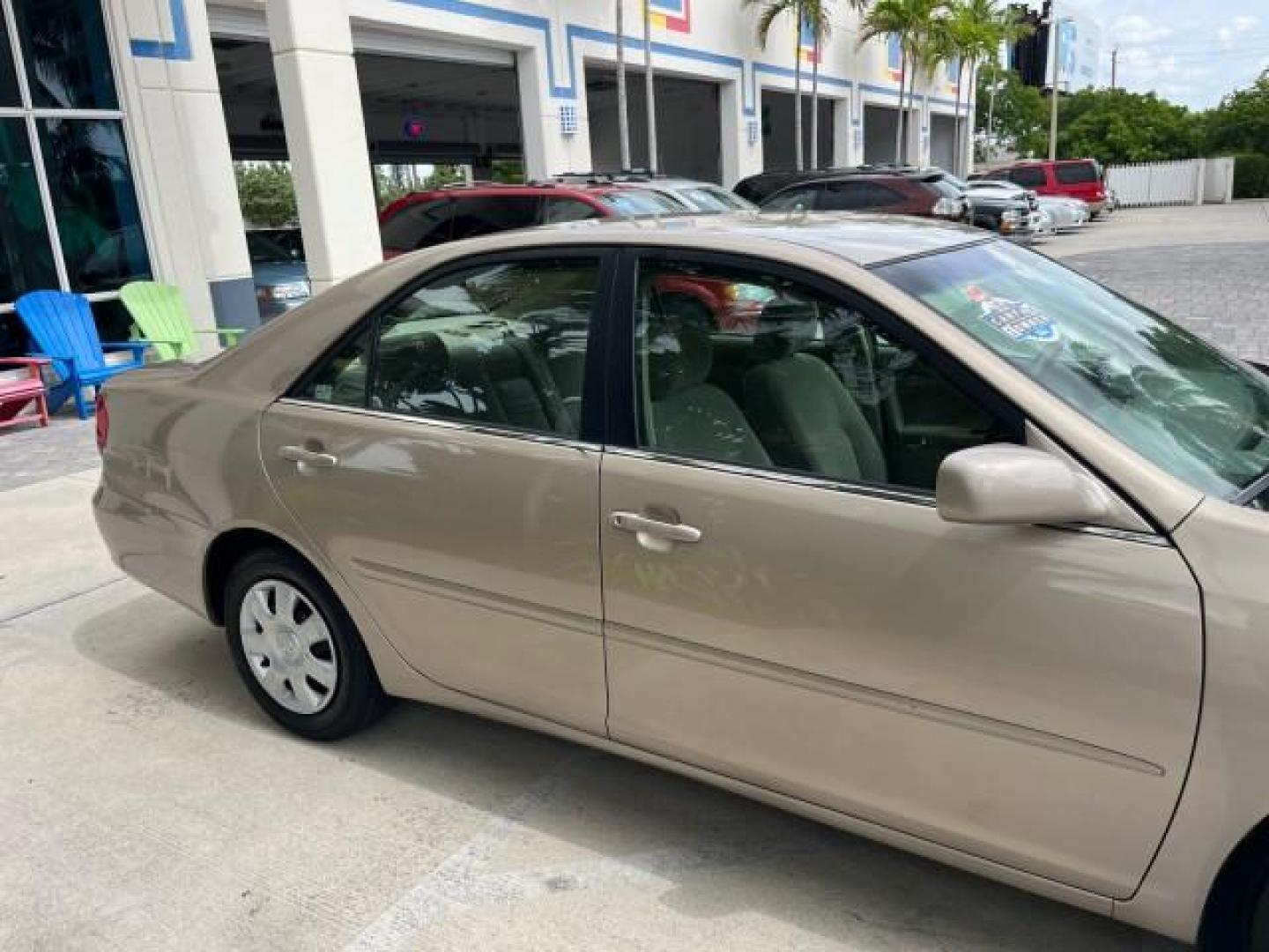 2003 Desert Sand Mica /Stone Toyota Camry 1 OWNER LE LOW MILES 57,114 (4T1BE32K73U) with an 2.4L DOHC Vvti 16-Valve 4-Cyl Engine engine, Automatic transmission, located at 4701 North Dixie Hwy, Pompano Beach, FL, 33064, (954) 422-2889, 26.240938, -80.123474 - OUR WEBPAGE FLORIDACARS1.COM HAS OVER 100 PHOTOS AND FREE CARFAX LINK 2003 TOYOTA CAMRY LE ROAD READY 2.4L I4 VIN: 4T1BE32K73U646722 NO RECALLS 32 MPG SEDAN 4 DR 1 OWNER 2.4L I4 F DOHC 16V LOW MILES 57,114 GASOLINE 7 SERVICE RECORDS FRONT WHEEL DRIVE POWER MIRRORS Approach Lights Cruise Control FWD - Photo#83