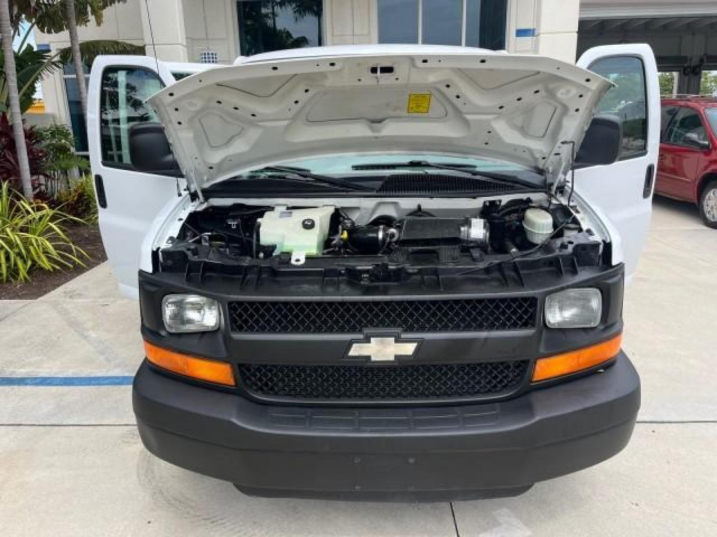 2005 Summit White /Neutral Chevrolet Express Cargo Van 1 FL 67,055 (1GCFG15X751) with an 4.3L Vortec 4300 V6 MFI Engine engine, Automatic transmission, located at 4701 North Dixie Hwy, Pompano Beach, FL, 33064, (954) 422-2889, 26.240938, -80.123474 - OUR WEBPAGE FLORIDACARS1.COM HAS OVER 100 PHOTOS AND FREE CARFAX LINK 2005 CHEVROLET EXPRESS 1500 ROAD READY WORK READY VIN: 1GCFG15X751260088 LOW MILES 67,055 VAN 1 OWNER FLORIDA 4.3L V6 F CLEAN GASOLINE 4.3L V6 REAR WHEEL DRIVE LEATHER SEATS Automatic Climate Control Front Bucket Seats RWD THIS IS - Photo#15