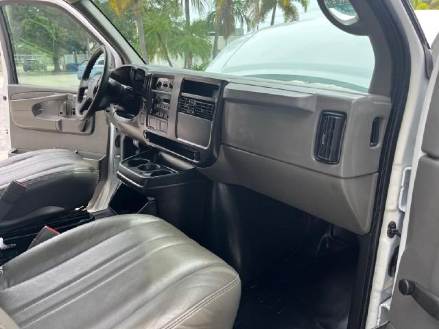 2005 Summit White /Neutral Chevrolet Express Cargo Van 1 FL 67,055 (1GCFG15X751) with an 4.3L Vortec 4300 V6 MFI Engine engine, Automatic transmission, located at 4701 North Dixie Hwy, Pompano Beach, FL, 33064, (954) 422-2889, 26.240938, -80.123474 - OUR WEBPAGE FLORIDACARS1.COM HAS OVER 100 PHOTOS AND FREE CARFAX LINK 2005 CHEVROLET EXPRESS 1500 ROAD READY WORK READY VIN: 1GCFG15X751260088 LOW MILES 67,055 VAN 1 OWNER FLORIDA 4.3L V6 F CLEAN GASOLINE 4.3L V6 REAR WHEEL DRIVE LEATHER SEATS Automatic Climate Control Front Bucket Seats RWD THIS IS - Photo#27