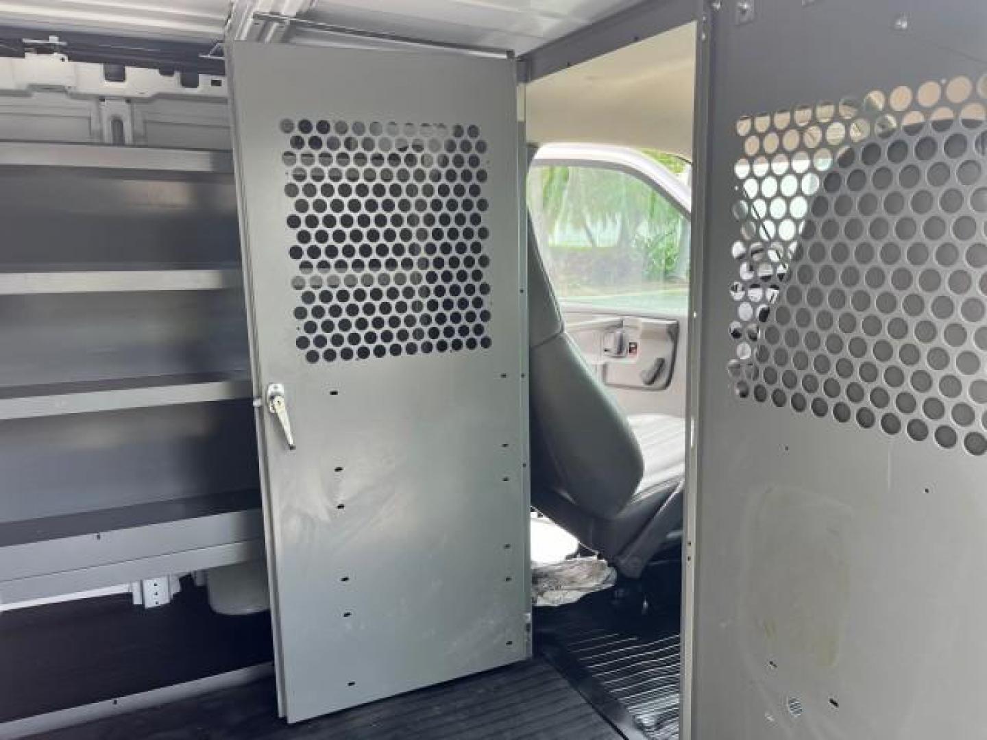 2005 Summit White /Neutral Chevrolet Express Cargo Van 1 FL 67,055 (1GCFG15X751) with an 4.3L Vortec 4300 V6 MFI Engine engine, Automatic transmission, located at 4701 North Dixie Hwy, Pompano Beach, FL, 33064, (954) 422-2889, 26.240938, -80.123474 - OUR WEBPAGE FLORIDACARS1.COM HAS OVER 100 PHOTOS AND FREE CARFAX LINK 2005 CHEVROLET EXPRESS 1500 ROAD READY WORK READY VIN: 1GCFG15X751260088 LOW MILES 67,055 VAN 1 OWNER FLORIDA 4.3L V6 F CLEAN GASOLINE 4.3L V6 REAR WHEEL DRIVE LEATHER SEATS Automatic Climate Control Front Bucket Seats RWD THIS IS - Photo#35