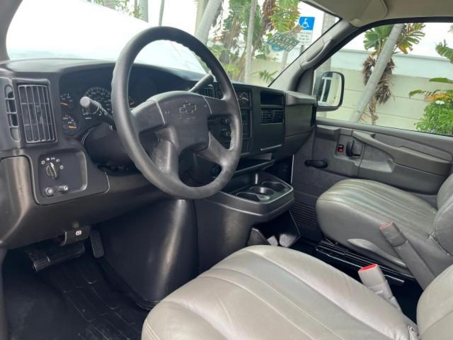 2005 Summit White /Neutral Chevrolet Express Cargo Van 1 FL 67,055 (1GCFG15X751) with an 4.3L Vortec 4300 V6 MFI Engine engine, Automatic transmission, located at 4701 North Dixie Hwy, Pompano Beach, FL, 33064, (954) 422-2889, 26.240938, -80.123474 - OUR WEBPAGE FLORIDACARS1.COM HAS OVER 100 PHOTOS AND FREE CARFAX LINK 2005 CHEVROLET EXPRESS 1500 ROAD READY WORK READY VIN: 1GCFG15X751260088 LOW MILES 67,055 VAN 1 OWNER FLORIDA 4.3L V6 F CLEAN GASOLINE 4.3L V6 REAR WHEEL DRIVE LEATHER SEATS Automatic Climate Control Front Bucket Seats RWD THIS IS - Photo#49