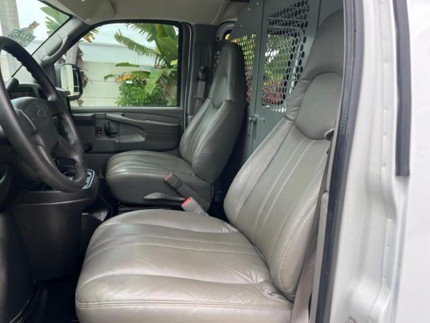 2005 Summit White /Neutral Chevrolet Express Cargo Van 1 FL 67,055 (1GCFG15X751) with an 4.3L Vortec 4300 V6 MFI Engine engine, Automatic transmission, located at 4701 North Dixie Hwy, Pompano Beach, FL, 33064, (954) 422-2889, 26.240938, -80.123474 - OUR WEBPAGE FLORIDACARS1.COM HAS OVER 100 PHOTOS AND FREE CARFAX LINK 2005 CHEVROLET EXPRESS 1500 ROAD READY WORK READY VIN: 1GCFG15X751260088 LOW MILES 67,055 VAN 1 OWNER FLORIDA 4.3L V6 F CLEAN GASOLINE 4.3L V6 REAR WHEEL DRIVE LEATHER SEATS Automatic Climate Control Front Bucket Seats RWD THIS IS - Photo#52