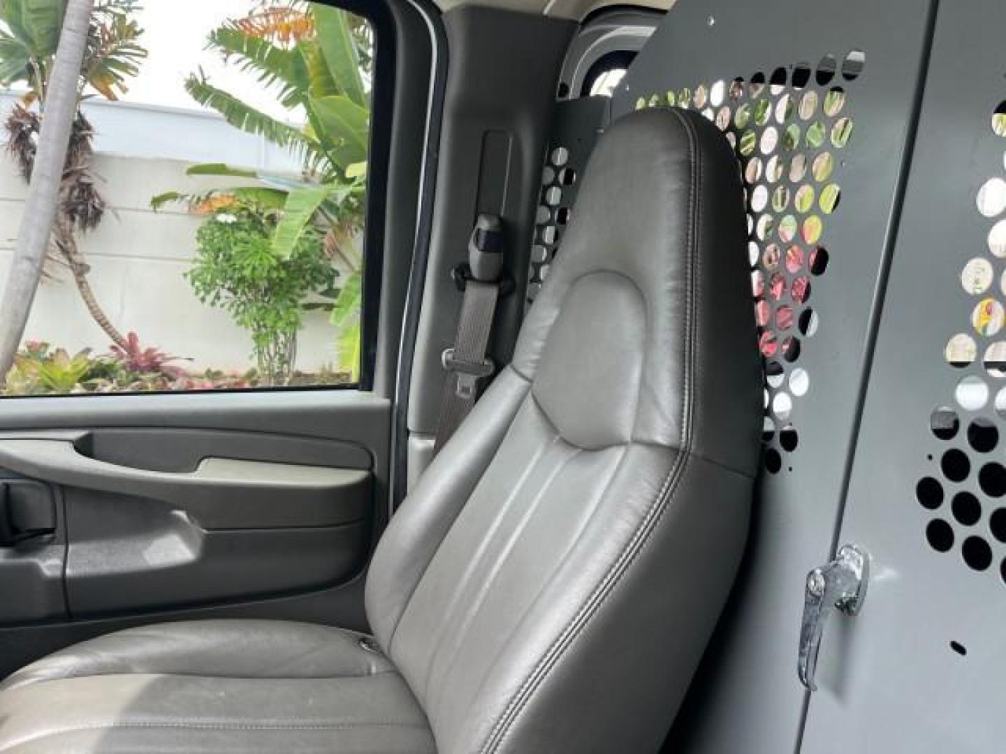 2005 Summit White /Neutral Chevrolet Express Cargo Van 1 FL 67,055 (1GCFG15X751) with an 4.3L Vortec 4300 V6 MFI Engine engine, Automatic transmission, located at 4701 North Dixie Hwy, Pompano Beach, FL, 33064, (954) 422-2889, 26.240938, -80.123474 - OUR WEBPAGE FLORIDACARS1.COM HAS OVER 100 PHOTOS AND FREE CARFAX LINK 2005 CHEVROLET EXPRESS 1500 ROAD READY WORK READY VIN: 1GCFG15X751260088 LOW MILES 67,055 VAN 1 OWNER FLORIDA 4.3L V6 F CLEAN GASOLINE 4.3L V6 REAR WHEEL DRIVE LEATHER SEATS Automatic Climate Control Front Bucket Seats RWD THIS IS - Photo#60