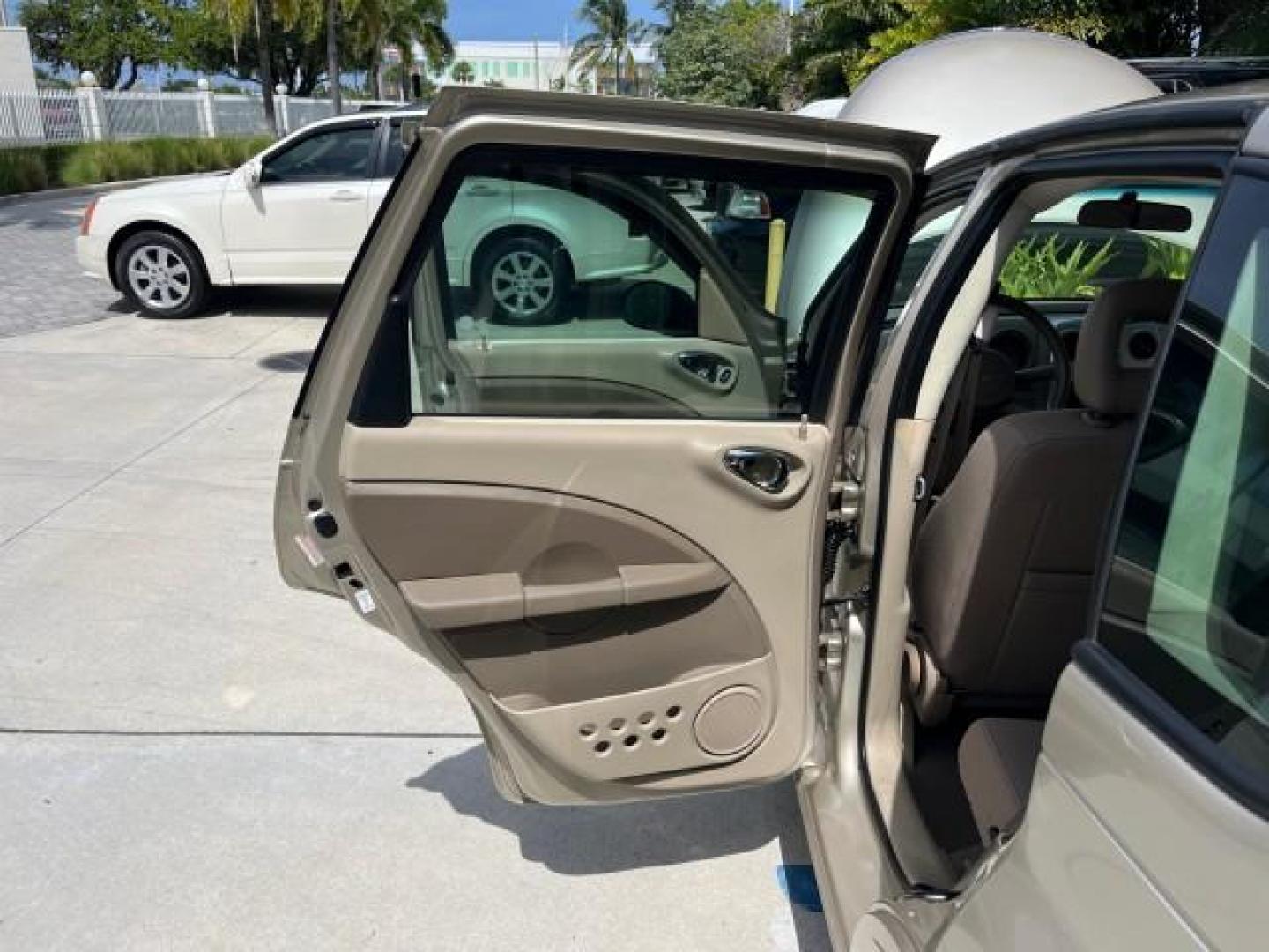 2006 Linen Gold Metallic Pearl /Pastel Pebble Beige Chrysler PT Cruiser Touring LOW MILES 56,453 (3A4FY58B46T) with an 2.4L DOHC SMPI 16-Valve I4 Engine engine, Automatic transmission, located at 4701 North Dixie Hwy, Pompano Beach, FL, 33064, (954) 422-2889, 26.240938, -80.123474 - OUR WEBPAGE FLORIDACARS1.COM HAS OVER 100 PHOTOS AND FREE CARFAX LINK 2006 CHRYSLER PT CRUISER TOURING ROAD READY 2.4L I4 VIN: 3A4FY58B46T320725 NO ACCIDENTS VAN NO RECALLS 29 MPG 2.4L I4 F DOHC 16V FLORIDA OWNER GASOLINE LOW MILES 56,453 FRONT WHEEL DRIVE POWER MIRRORS 19 SERVICE RECORDS Additional - Photo#13