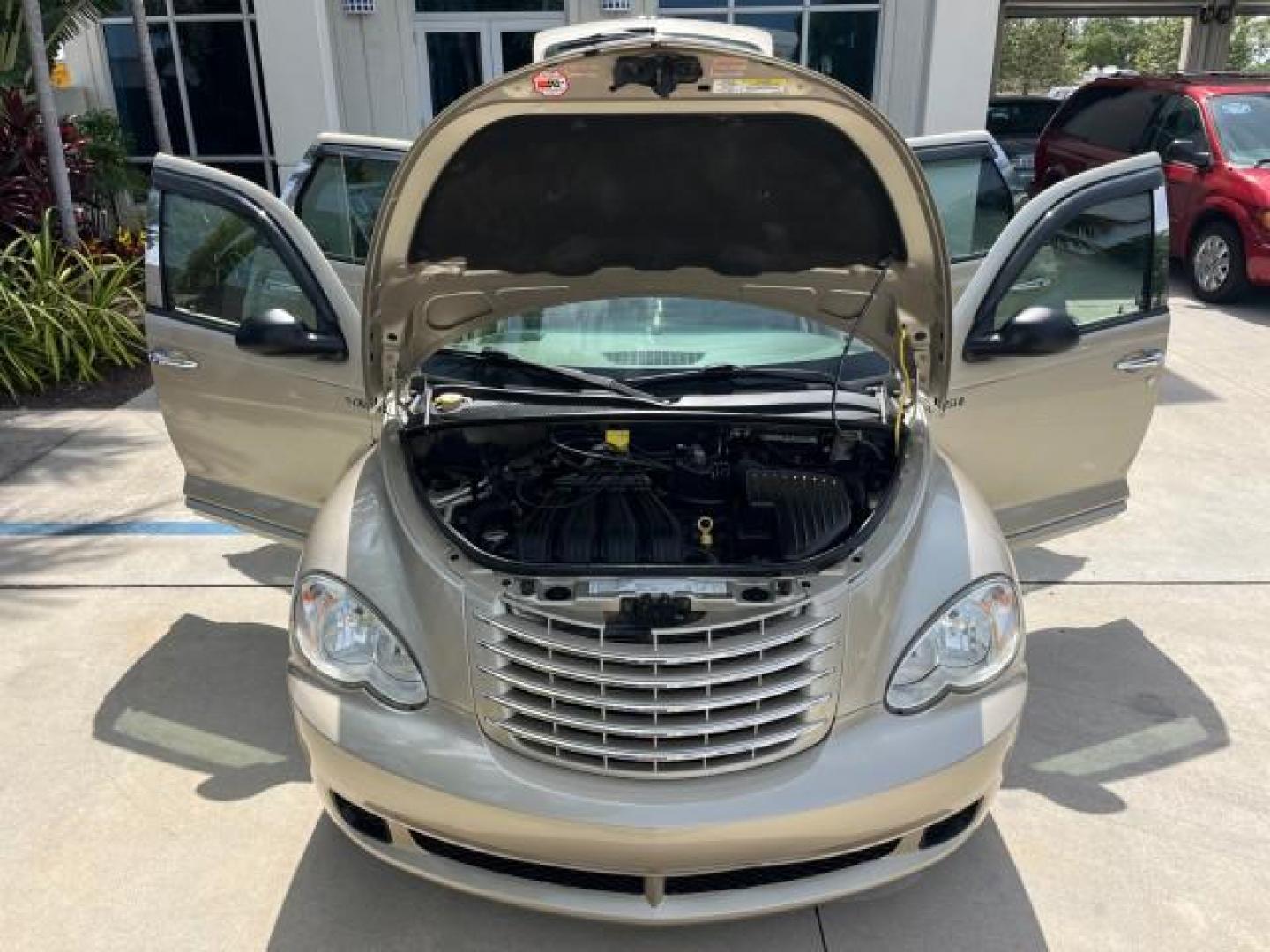 2006 Linen Gold Metallic Pearl /Pastel Pebble Beige Chrysler PT Cruiser Touring LOW MILES 56,453 (3A4FY58B46T) with an 2.4L DOHC SMPI 16-Valve I4 Engine engine, Automatic transmission, located at 4701 North Dixie Hwy, Pompano Beach, FL, 33064, (954) 422-2889, 26.240938, -80.123474 - OUR WEBPAGE FLORIDACARS1.COM HAS OVER 100 PHOTOS AND FREE CARFAX LINK 2006 CHRYSLER PT CRUISER TOURING ROAD READY 2.4L I4 VIN: 3A4FY58B46T320725 NO ACCIDENTS VAN NO RECALLS 29 MPG 2.4L I4 F DOHC 16V FLORIDA OWNER GASOLINE LOW MILES 56,453 FRONT WHEEL DRIVE POWER MIRRORS 19 SERVICE RECORDS Additional - Photo#16