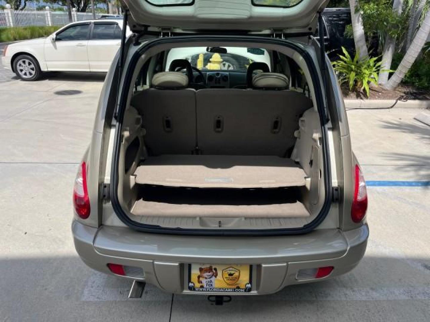 2006 Linen Gold Metallic Pearl /Pastel Pebble Beige Chrysler PT Cruiser Touring LOW MILES 56,453 (3A4FY58B46T) with an 2.4L DOHC SMPI 16-Valve I4 Engine engine, Automatic transmission, located at 4701 North Dixie Hwy, Pompano Beach, FL, 33064, (954) 422-2889, 26.240938, -80.123474 - OUR WEBPAGE FLORIDACARS1.COM HAS OVER 100 PHOTOS AND FREE CARFAX LINK 2006 CHRYSLER PT CRUISER TOURING ROAD READY 2.4L I4 VIN: 3A4FY58B46T320725 NO ACCIDENTS VAN NO RECALLS 29 MPG 2.4L I4 F DOHC 16V FLORIDA OWNER GASOLINE LOW MILES 56,453 FRONT WHEEL DRIVE POWER MIRRORS 19 SERVICE RECORDS Additional - Photo#60