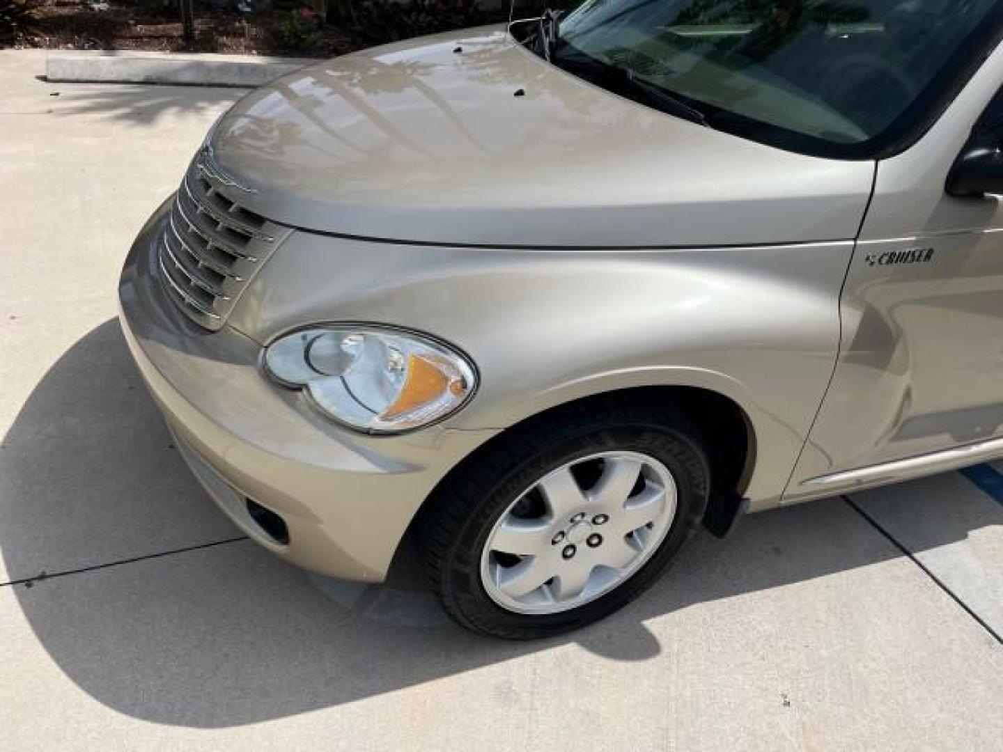 2006 Linen Gold Metallic Pearl /Pastel Pebble Beige Chrysler PT Cruiser Touring LOW MILES 56,453 (3A4FY58B46T) with an 2.4L DOHC SMPI 16-Valve I4 Engine engine, Automatic transmission, located at 4701 North Dixie Hwy, Pompano Beach, FL, 33064, (954) 422-2889, 26.240938, -80.123474 - OUR WEBPAGE FLORIDACARS1.COM HAS OVER 100 PHOTOS AND FREE CARFAX LINK 2006 CHRYSLER PT CRUISER TOURING ROAD READY 2.4L I4 VIN: 3A4FY58B46T320725 NO ACCIDENTS VAN NO RECALLS 29 MPG 2.4L I4 F DOHC 16V FLORIDA OWNER GASOLINE LOW MILES 56,453 FRONT WHEEL DRIVE POWER MIRRORS 19 SERVICE RECORDS Additional - Photo#78