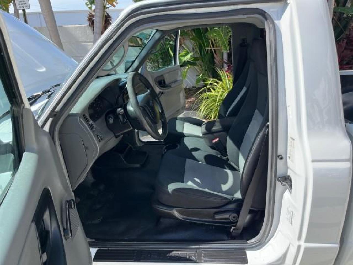 2006 Oxford White /Medium Dk Flint Ford Ranger XL LOW MILES 88,391 (1FTYR10D66P) with an 2.3L DOHC 16-Valve I4 Engine engine, Automatic transmission, located at 4701 North Dixie Hwy, Pompano Beach, FL, 33064, (954) 422-2889, 26.240938, -80.123474 - OUR WEBPAGE FLORIDACARS1.COM HAS OVER 100 PHOTOS AND FREE CARFAX LINK 2006 FORD RANGER XL ROAD READY WORK READY VIN: 1FTYR10D66PA49267 2.3L I 4 29 MPG PICKUP 13 SERVICE RECORDS 2.3L 4 F NO ACCIDENTS GASOLINE LOW MILES 88,391 REAR WHEEL DRIVE 6 FT BED LENGHT Connected Car Electronic Braking System Ma - Photo#10