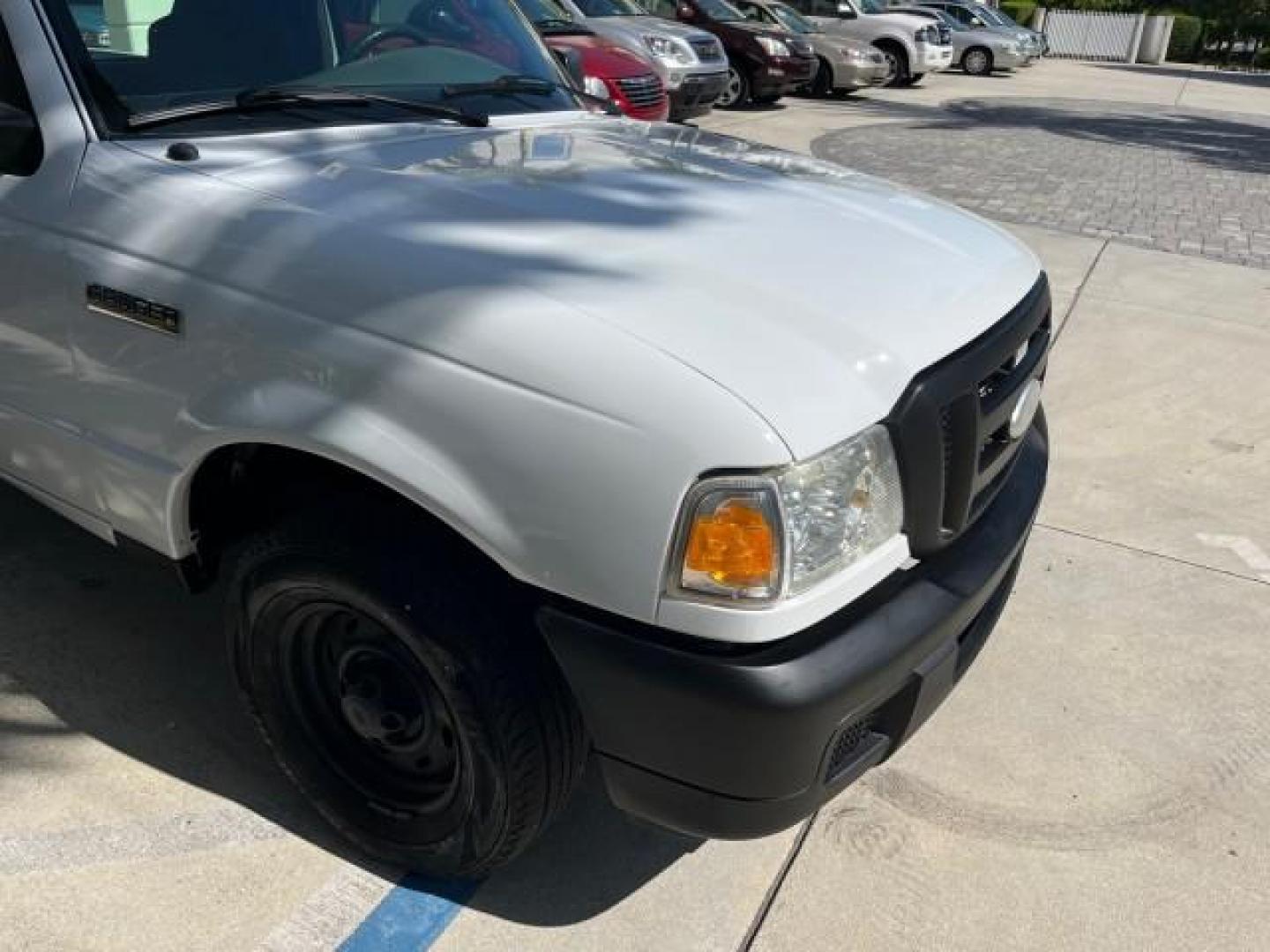 2006 Oxford White /Medium Dk Flint Ford Ranger XL LOW MILES 88,391 (1FTYR10D66P) with an 2.3L DOHC 16-Valve I4 Engine engine, Automatic transmission, located at 4701 North Dixie Hwy, Pompano Beach, FL, 33064, (954) 422-2889, 26.240938, -80.123474 - OUR WEBPAGE FLORIDACARS1.COM HAS OVER 100 PHOTOS AND FREE CARFAX LINK 2006 FORD RANGER XL ROAD READY WORK READY VIN: 1FTYR10D66PA49267 2.3L I 4 29 MPG PICKUP 13 SERVICE RECORDS 2.3L 4 F NO ACCIDENTS GASOLINE LOW MILES 88,391 REAR WHEEL DRIVE 6 FT BED LENGHT Connected Car Electronic Braking System Ma - Photo#59