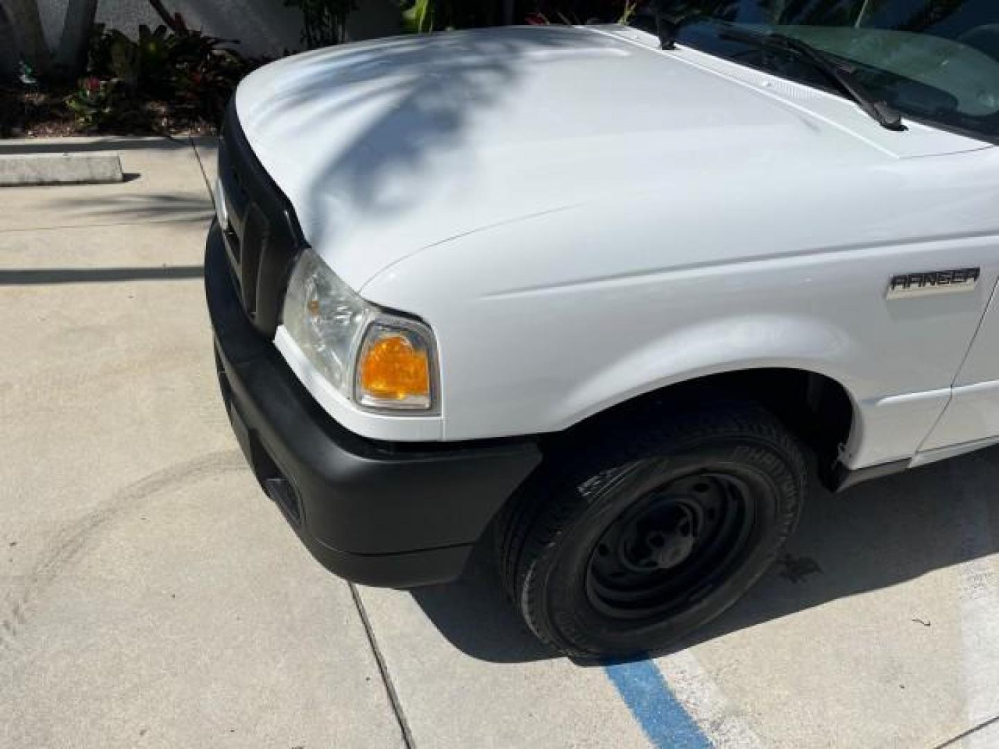 2006 Oxford White /Medium Dk Flint Ford Ranger XL LOW MILES 88,391 (1FTYR10D66P) with an 2.3L DOHC 16-Valve I4 Engine engine, Automatic transmission, located at 4701 North Dixie Hwy, Pompano Beach, FL, 33064, (954) 422-2889, 26.240938, -80.123474 - OUR WEBPAGE FLORIDACARS1.COM HAS OVER 100 PHOTOS AND FREE CARFAX LINK 2006 FORD RANGER XL ROAD READY WORK READY VIN: 1FTYR10D66PA49267 2.3L I 4 29 MPG PICKUP 13 SERVICE RECORDS 2.3L 4 F NO ACCIDENTS GASOLINE LOW MILES 88,391 REAR WHEEL DRIVE 6 FT BED LENGHT Connected Car Electronic Braking System Ma - Photo#60