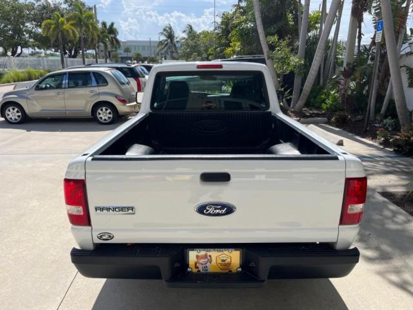 2006 Oxford White /Medium Dk Flint Ford Ranger XL LOW MILES 88,391 (1FTYR10D66P) with an 2.3L DOHC 16-Valve I4 Engine engine, Automatic transmission, located at 4701 North Dixie Hwy, Pompano Beach, FL, 33064, (954) 422-2889, 26.240938, -80.123474 - OUR WEBPAGE FLORIDACARS1.COM HAS OVER 100 PHOTOS AND FREE CARFAX LINK 2006 FORD RANGER XL ROAD READY WORK READY VIN: 1FTYR10D66PA49267 2.3L I 4 29 MPG PICKUP 13 SERVICE RECORDS 2.3L 4 F NO ACCIDENTS GASOLINE LOW MILES 88,391 REAR WHEEL DRIVE 6 FT BED LENGHT Connected Car Electronic Braking System Ma - Photo#67