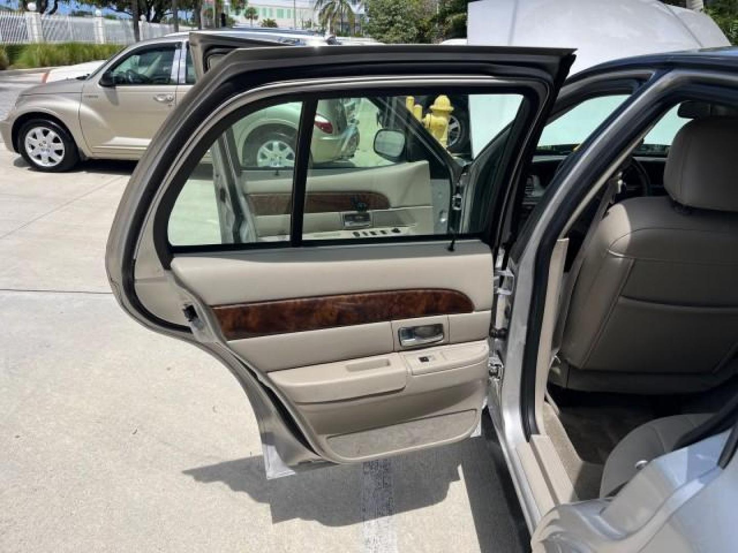 2009 Smokestone Metallic /Medium light stone Mercury Grand Marquis ULTIMATE LS LOW MILES 67,706 (2MEHM75V59X) with an 4.6L OHC SEFI FFV V8 Engine engine, Automatic transmission, located at 4701 North Dixie Hwy, Pompano Beach, FL, 33064, (954) 422-2889, 26.240938, -80.123474 - OUR WEBPAGE FLORIDACARS1.COM HAS OVER 100 PHOTOS AND FREE CARFAX LINK 2009 MERCURY GRAND MARQUIS LS ROAD READY 4.6L V8 VIN: 2MEHM75V59X610557 NO ACCIDENTS SEDAN 4 DR NO RECALLS 4.6L V8 F SOHC 16V LOW MILES 67,706 FLEX FUEL 12 SERVICE RECORDS REAR WHEEL DRIVE POWER LEATHER SEATS Adaptive Headlights A - Photo#13