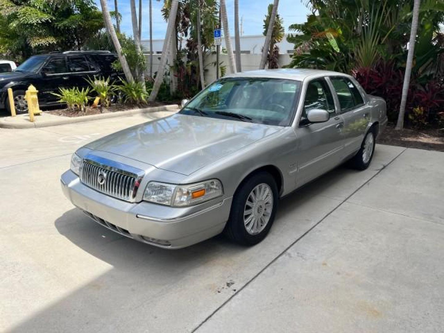 2009 Smokestone Metallic /Medium light stone Mercury Grand Marquis ULTIMATE LS LOW MILES 67,706 (2MEHM75V59X) with an 4.6L OHC SEFI FFV V8 Engine engine, Automatic transmission, located at 4701 North Dixie Hwy, Pompano Beach, FL, 33064, (954) 422-2889, 26.240938, -80.123474 - OUR WEBPAGE FLORIDACARS1.COM HAS OVER 100 PHOTOS AND FREE CARFAX LINK 2009 MERCURY GRAND MARQUIS LS ROAD READY 4.6L V8 VIN: 2MEHM75V59X610557 NO ACCIDENTS SEDAN 4 DR NO RECALLS 4.6L V8 F SOHC 16V LOW MILES 67,706 FLEX FUEL 12 SERVICE RECORDS REAR WHEEL DRIVE POWER LEATHER SEATS Adaptive Headlights A - Photo#3