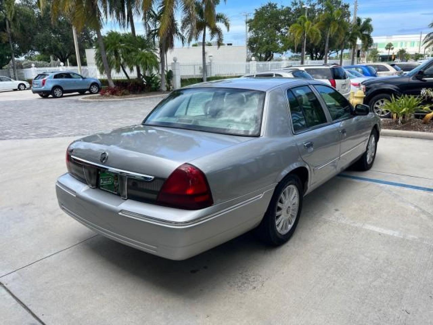 2009 Smokestone Metallic /Medium light stone Mercury Grand Marquis ULTIMATE LS LOW MILES 67,706 (2MEHM75V59X) with an 4.6L OHC SEFI FFV V8 Engine engine, Automatic transmission, located at 4701 North Dixie Hwy, Pompano Beach, FL, 33064, (954) 422-2889, 26.240938, -80.123474 - OUR WEBPAGE FLORIDACARS1.COM HAS OVER 100 PHOTOS AND FREE CARFAX LINK 2009 MERCURY GRAND MARQUIS LS ROAD READY 4.6L V8 VIN: 2MEHM75V59X610557 NO ACCIDENTS SEDAN 4 DR NO RECALLS 4.6L V8 F SOHC 16V LOW MILES 67,706 FLEX FUEL 12 SERVICE RECORDS REAR WHEEL DRIVE POWER LEATHER SEATS Adaptive Headlights A - Photo#7