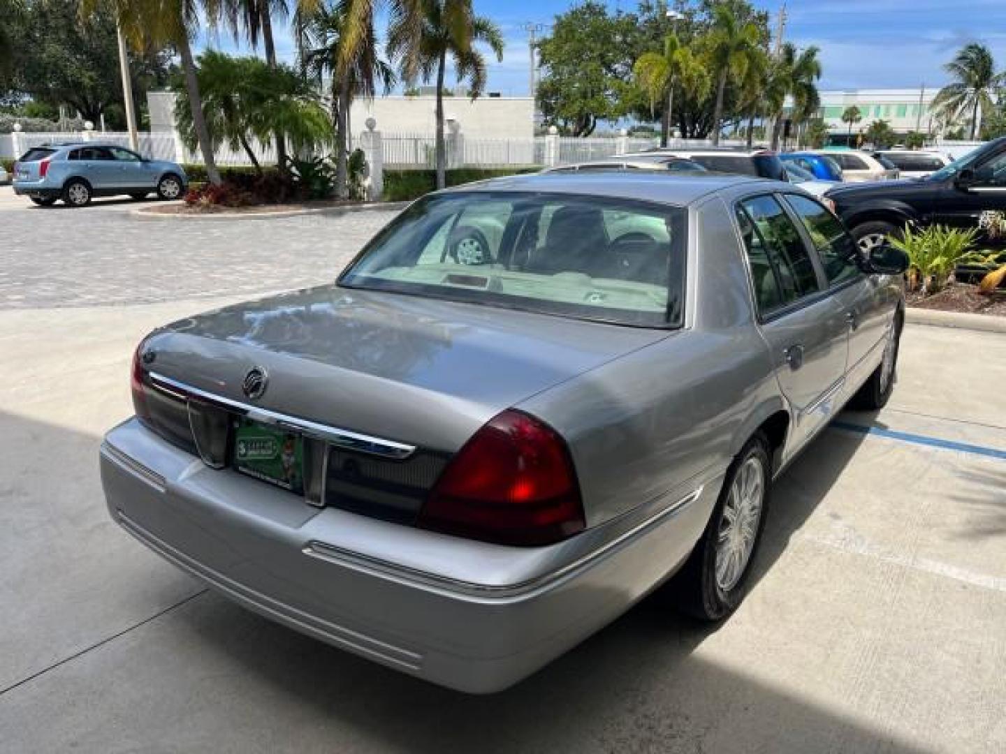 2009 Smokestone Metallic /Medium light stone Mercury Grand Marquis ULTIMATE LS LOW MILES 67,706 (2MEHM75V59X) with an 4.6L OHC SEFI FFV V8 Engine engine, Automatic transmission, located at 4701 North Dixie Hwy, Pompano Beach, FL, 33064, (954) 422-2889, 26.240938, -80.123474 - OUR WEBPAGE FLORIDACARS1.COM HAS OVER 100 PHOTOS AND FREE CARFAX LINK 2009 MERCURY GRAND MARQUIS LS ROAD READY 4.6L V8 VIN: 2MEHM75V59X610557 NO ACCIDENTS SEDAN 4 DR NO RECALLS 4.6L V8 F SOHC 16V LOW MILES 67,706 FLEX FUEL 12 SERVICE RECORDS REAR WHEEL DRIVE POWER LEATHER SEATS Adaptive Headlights A - Photo#90