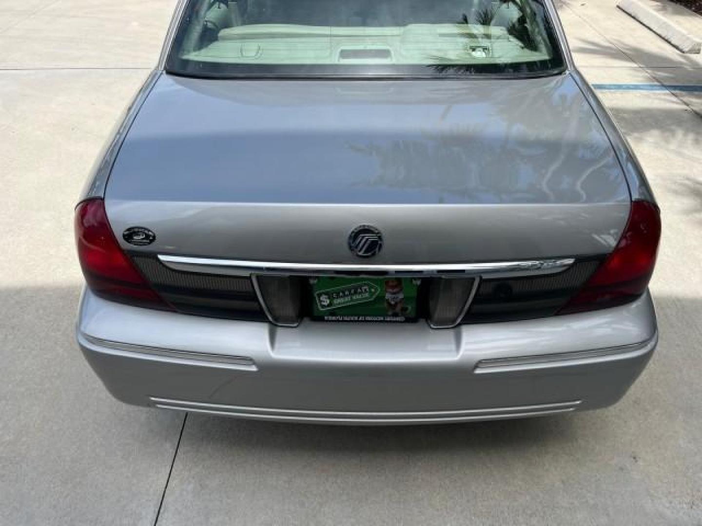 2009 Smokestone Metallic /Medium light stone Mercury Grand Marquis ULTIMATE LS LOW MILES 67,706 (2MEHM75V59X) with an 4.6L OHC SEFI FFV V8 Engine engine, Automatic transmission, located at 4701 North Dixie Hwy, Pompano Beach, FL, 33064, (954) 422-2889, 26.240938, -80.123474 - OUR WEBPAGE FLORIDACARS1.COM HAS OVER 100 PHOTOS AND FREE CARFAX LINK 2009 MERCURY GRAND MARQUIS LS ROAD READY 4.6L V8 VIN: 2MEHM75V59X610557 NO ACCIDENTS SEDAN 4 DR NO RECALLS 4.6L V8 F SOHC 16V LOW MILES 67,706 FLEX FUEL 12 SERVICE RECORDS REAR WHEEL DRIVE POWER LEATHER SEATS Adaptive Headlights A - Photo#94