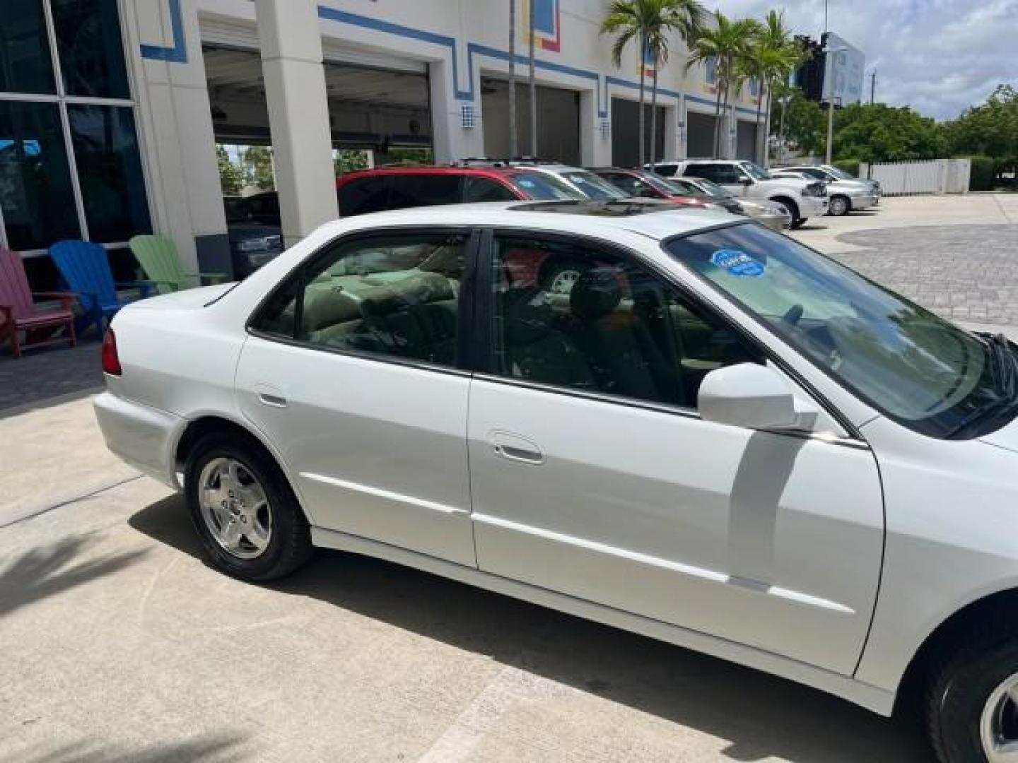 2000 Taffeta White /Quartz Honda Accord Sdn EX w/Leather LOW MILES 56,836 (1HGCG1650YA) with an 3.0L VTEC LEV-Certified V6 Engine engine, Automatic transmission, located at 4701 North Dixie Hwy, Pompano Beach, FL, 33064, (954) 422-2889, 26.240938, -80.123474 - OUR WEBPAGE FLORIDACARS1.COM HAS OVER 100 PHOTOS AND FREE CARFAX LINK 2000 HONDA ACCORD EX V6 ROAD READY 3.0L V6 VIN: 1HGCG1650YA037493 FLORIDA OWNER 28 MPG SEDAN 4 DR POWER LEATHER SEATS 3.0L V6 F SOHC 24V POWER SUNROOF/MIRRORS GASOLINE LOW MILES 56,836 FRONT WHEEL DRIVE 22 SERVICE RECORDS Alloy Wh - Photo#82