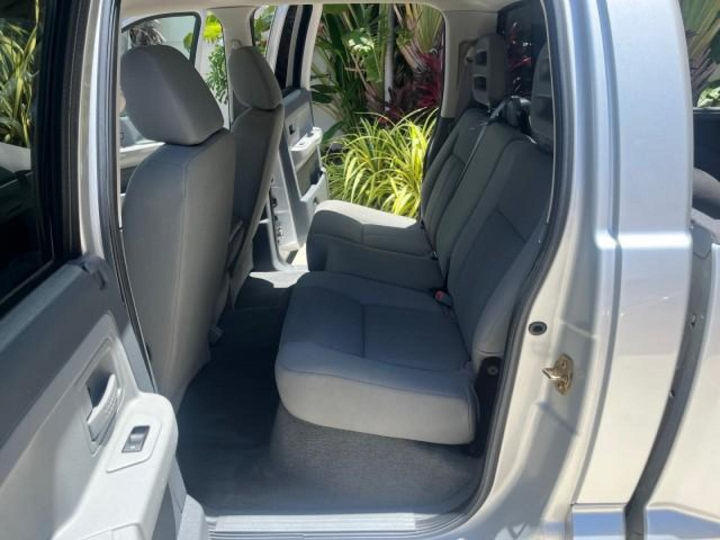 2006 Bright Silver Metallic /Med Slate Gray Dodge Dakota SLT 4 DR CREW LOW MILES 66,598 (1D7HE48NX6S) with an 4.7L V8 Magnum Engine engine, Automatic transmission, located at 4701 North Dixie Hwy, Pompano Beach, FL, 33064, (954) 422-2889, 26.240938, -80.123474 - OUR WEBPAGE FLORIDACARS1.COM HAS OVER 100 PHOTOS AND FREE CARFAX LINK 2006 DODGE DAKOTA SLT ROAD READY 4.7L V8 VIN: 1D7HE48NX6S517370 NO ACCIDENTS CREW PICKUP NO RECALLS 4.7L V8 F OHV 1 OWNER 5,4 FT BED GASOLINE LOW MILES 66,598 REAR WHEEL DRIVE 24 SERVICE RECORDS 5.4' Bed Length Anti-Theft System C - Photo#14