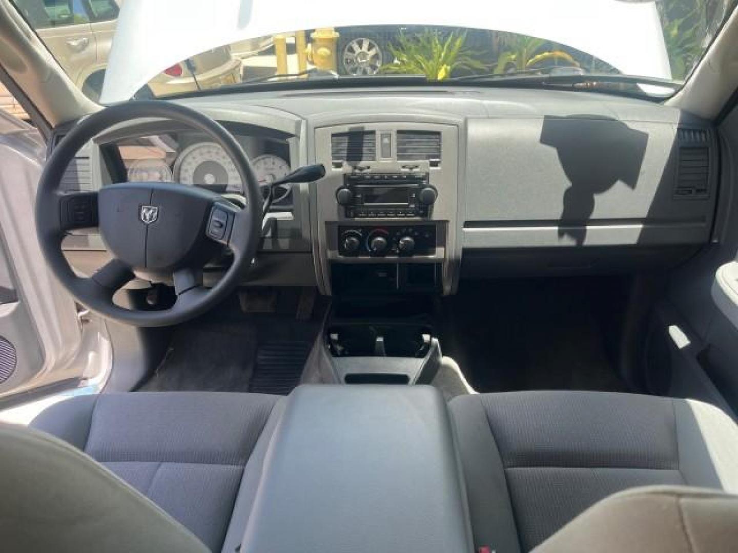 2006 Bright Silver Metallic /Med Slate Gray Dodge Dakota SLT 4 DR CREW LOW MILES 66,598 (1D7HE48NX6S) with an 4.7L V8 Magnum Engine engine, Automatic transmission, located at 4701 North Dixie Hwy, Pompano Beach, FL, 33064, (954) 422-2889, 26.240938, -80.123474 - OUR WEBPAGE FLORIDACARS1.COM HAS OVER 100 PHOTOS AND FREE CARFAX LINK 2006 DODGE DAKOTA SLT ROAD READY 4.7L V8 VIN: 1D7HE48NX6S517370 NO ACCIDENTS CREW PICKUP NO RECALLS 4.7L V8 F OHV 1 OWNER 5,4 FT BED GASOLINE LOW MILES 66,598 REAR WHEEL DRIVE 24 SERVICE RECORDS 5.4' Bed Length Anti-Theft System C - Photo#34