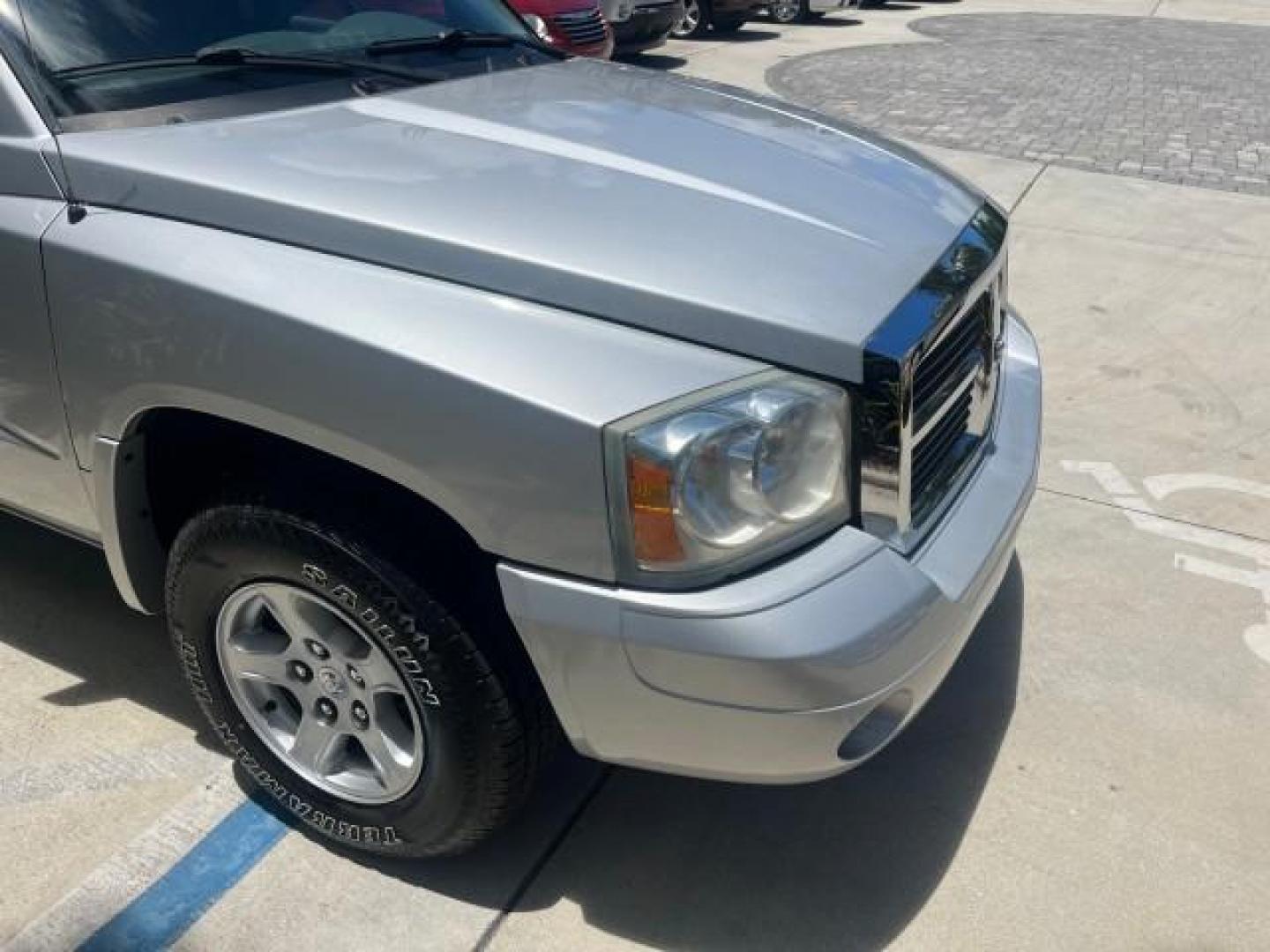 2006 Bright Silver Metallic /Med Slate Gray Dodge Dakota SLT 4 DR CREW LOW MILES 66,598 (1D7HE48NX6S) with an 4.7L V8 Magnum Engine engine, Automatic transmission, located at 4701 North Dixie Hwy, Pompano Beach, FL, 33064, (954) 422-2889, 26.240938, -80.123474 - OUR WEBPAGE FLORIDACARS1.COM HAS OVER 100 PHOTOS AND FREE CARFAX LINK 2006 DODGE DAKOTA SLT ROAD READY 4.7L V8 VIN: 1D7HE48NX6S517370 NO ACCIDENTS CREW PICKUP NO RECALLS 4.7L V8 F OHV 1 OWNER 5,4 FT BED GASOLINE LOW MILES 66,598 REAR WHEEL DRIVE 24 SERVICE RECORDS 5.4' Bed Length Anti-Theft System C - Photo#87