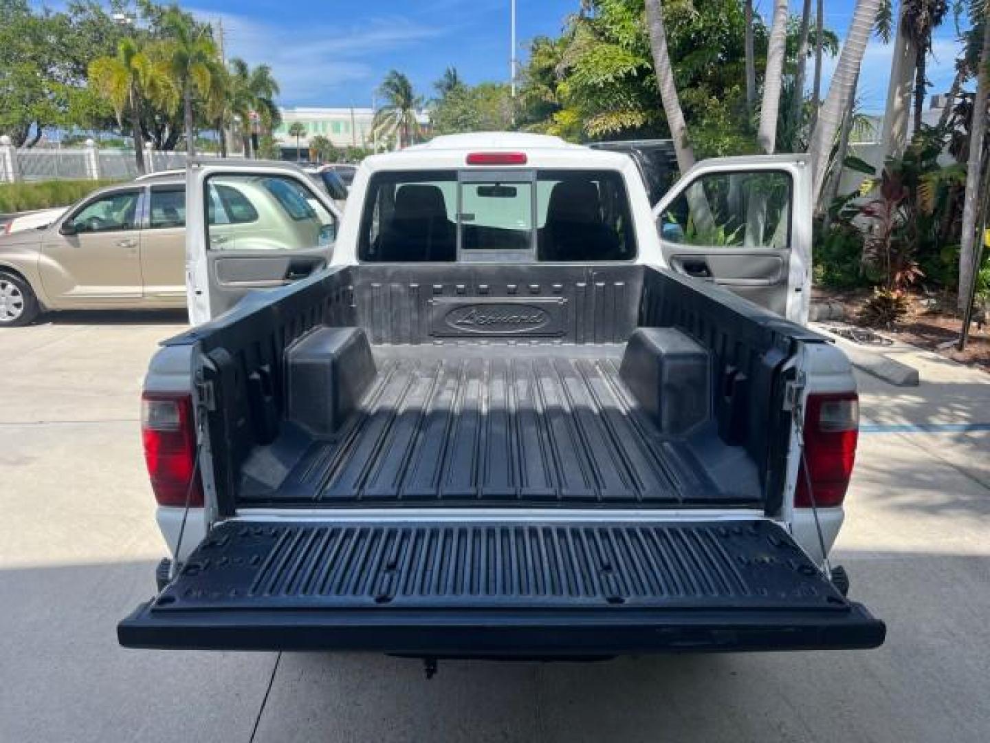 2004 Oxford White /Medium Dk Flint Ford Ranger Edge LOW MILES 89,753 (1FTYR10U14T) with an 3.0L SEFI V6 Engine engine, Automatic transmission, located at 4701 North Dixie Hwy, Pompano Beach, FL, 33064, (954) 422-2889, 26.240938, -80.123474 - OUR WEBPAGE FLORIDACARS1.COM HAS OVER 100 PHOTOS AND FREE CARFAX LINK 2004 FORD RANGER XLT ROAD READY 3.OL V6 VIN: 1FTYR10U14TA20148 NO ACCIDENTS PICKUP LOW MILES 89,753 3.0L V6 F OHV FLORIDA OWNER GASOLINE 4 SERVICE RECORDS REAR WHEEL DRIVE 6 FT BED Alloy Wheels Anti-Theft System Approach Lights Au - Photo#13