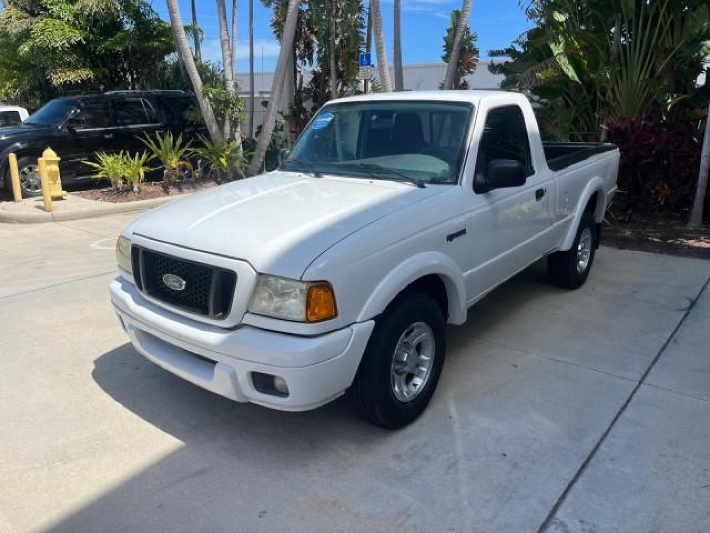 2004 Oxford White /Medium Dk Flint Ford Ranger Edge LOW MILES 89,753 (1FTYR10U14T) with an 3.0L SEFI V6 Engine engine, Automatic transmission, located at 4701 North Dixie Hwy, Pompano Beach, FL, 33064, (954) 422-2889, 26.240938, -80.123474 - OUR WEBPAGE FLORIDACARS1.COM HAS OVER 100 PHOTOS AND FREE CARFAX LINK 2004 FORD RANGER XLT ROAD READY 3.OL V6 VIN: 1FTYR10U14TA20148 NO ACCIDENTS PICKUP LOW MILES 89,753 3.0L V6 F OHV FLORIDA OWNER GASOLINE 4 SERVICE RECORDS REAR WHEEL DRIVE 6 FT BED Alloy Wheels Anti-Theft System Approach Lights Au - Photo#3