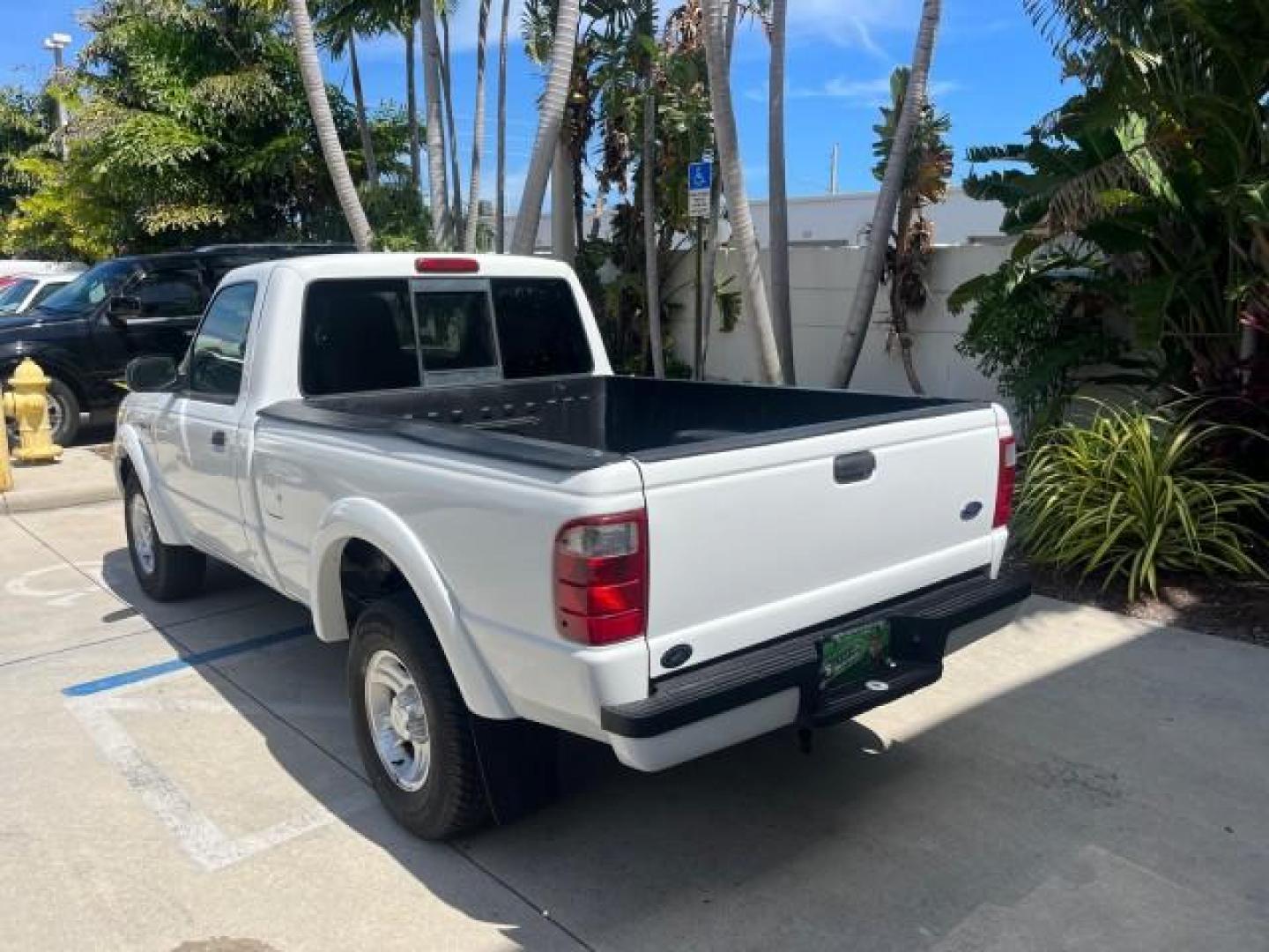 2004 Oxford White /Medium Dk Flint Ford Ranger Edge LOW MILES 89,753 (1FTYR10U14T) with an 3.0L SEFI V6 Engine engine, Automatic transmission, located at 4701 North Dixie Hwy, Pompano Beach, FL, 33064, (954) 422-2889, 26.240938, -80.123474 - OUR WEBPAGE FLORIDACARS1.COM HAS OVER 100 PHOTOS AND FREE CARFAX LINK 2004 FORD RANGER XLT ROAD READY 3.OL V6 VIN: 1FTYR10U14TA20148 NO ACCIDENTS PICKUP LOW MILES 89,753 3.0L V6 F OHV FLORIDA OWNER GASOLINE 4 SERVICE RECORDS REAR WHEEL DRIVE 6 FT BED Alloy Wheels Anti-Theft System Approach Lights Au - Photo#5