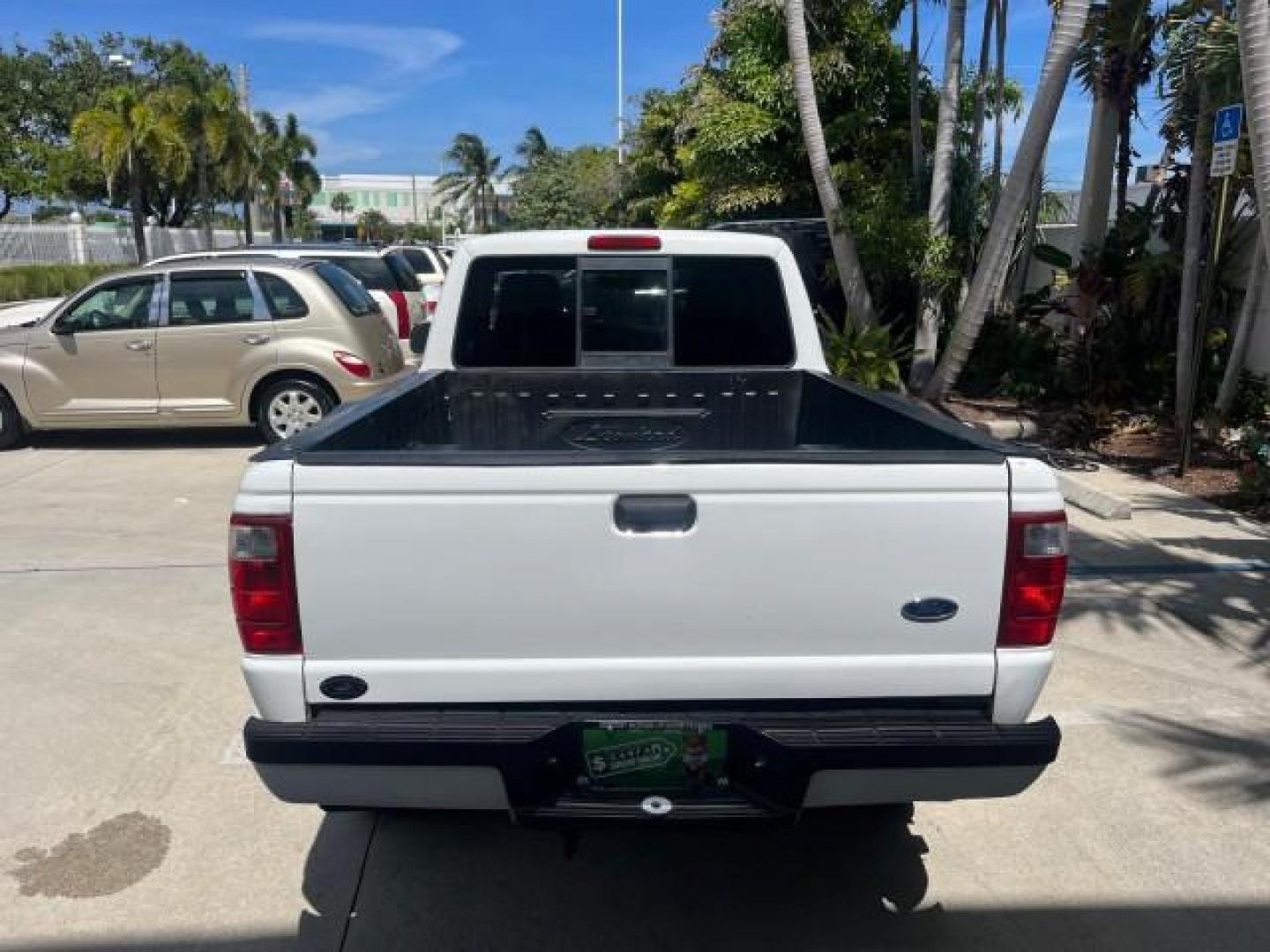 2004 Oxford White /Medium Dk Flint Ford Ranger Edge LOW MILES 89,753 (1FTYR10U14T) with an 3.0L SEFI V6 Engine engine, Automatic transmission, located at 4701 North Dixie Hwy, Pompano Beach, FL, 33064, (954) 422-2889, 26.240938, -80.123474 - OUR WEBPAGE FLORIDACARS1.COM HAS OVER 100 PHOTOS AND FREE CARFAX LINK 2004 FORD RANGER XLT ROAD READY 3.OL V6 VIN: 1FTYR10U14TA20148 NO ACCIDENTS PICKUP LOW MILES 89,753 3.0L V6 F OHV FLORIDA OWNER GASOLINE 4 SERVICE RECORDS REAR WHEEL DRIVE 6 FT BED Alloy Wheels Anti-Theft System Approach Lights Au - Photo#6