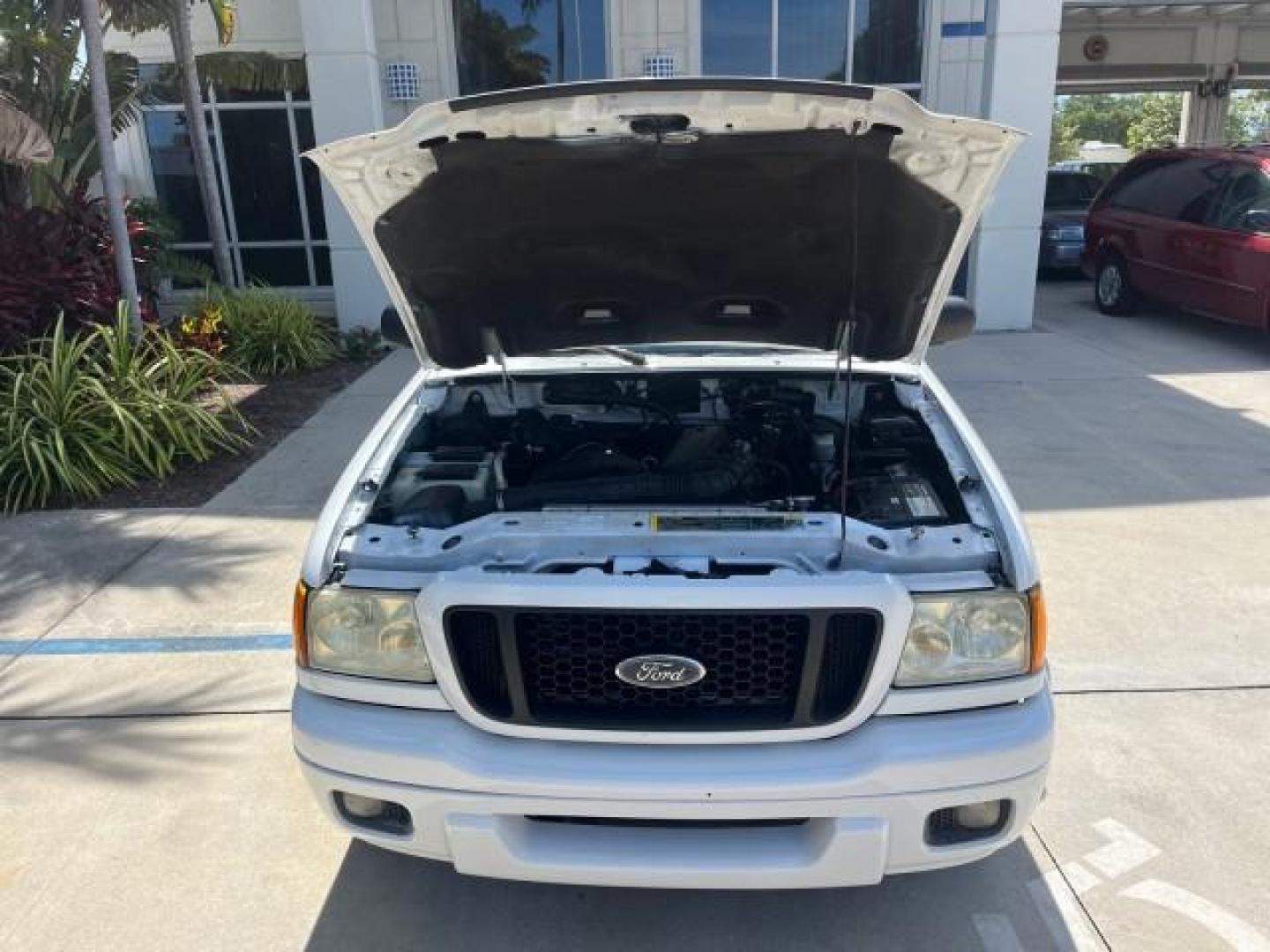 2004 Oxford White /Medium Dk Flint Ford Ranger Edge LOW MILES 89,753 (1FTYR10U14T) with an 3.0L SEFI V6 Engine engine, Automatic transmission, located at 4701 North Dixie Hwy, Pompano Beach, FL, 33064, (954) 422-2889, 26.240938, -80.123474 - OUR WEBPAGE FLORIDACARS1.COM HAS OVER 100 PHOTOS AND FREE CARFAX LINK 2004 FORD RANGER XLT ROAD READY 3.OL V6 VIN: 1FTYR10U14TA20148 NO ACCIDENTS PICKUP LOW MILES 89,753 3.0L V6 F OHV FLORIDA OWNER GASOLINE 4 SERVICE RECORDS REAR WHEEL DRIVE 6 FT BED Alloy Wheels Anti-Theft System Approach Lights Au - Photo#69