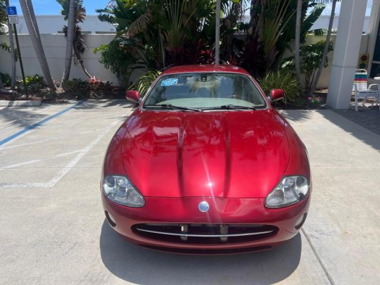 2005 Radiance /Ivory Jaguar XK8 XK8 COUPE LOW MILES 67,921 (SAJDA41C652) with an 4.2L DOHC EFI 32-Valve Aluminum Alloy V8 Engine engine, Automatic transmission, located at 4701 North Dixie Hwy, Pompano Beach, FL, 33064, (954) 422-2889, 26.240938, -80.123474 - OUR WEBPAGE FLORIDACARS1.COM HAS OVER 100 PHOTOS AND FREE CARFAX LINK 2005 JAGUAR XK-SERIES XK8 NEW $73,230 ROAD READY VIN: SAJDA41C652A41179 NO ACCIDENTS NO RECALLS COUPE FLORIDA OWNER 4.2L V8 4.2L V8 F DOHC LOW MILES 67,921 GASOLINE HEATED MIRRORS POWER HEATED LEATHER SEATS REAR WHEEL DRIVE PARKIN - Photo#2