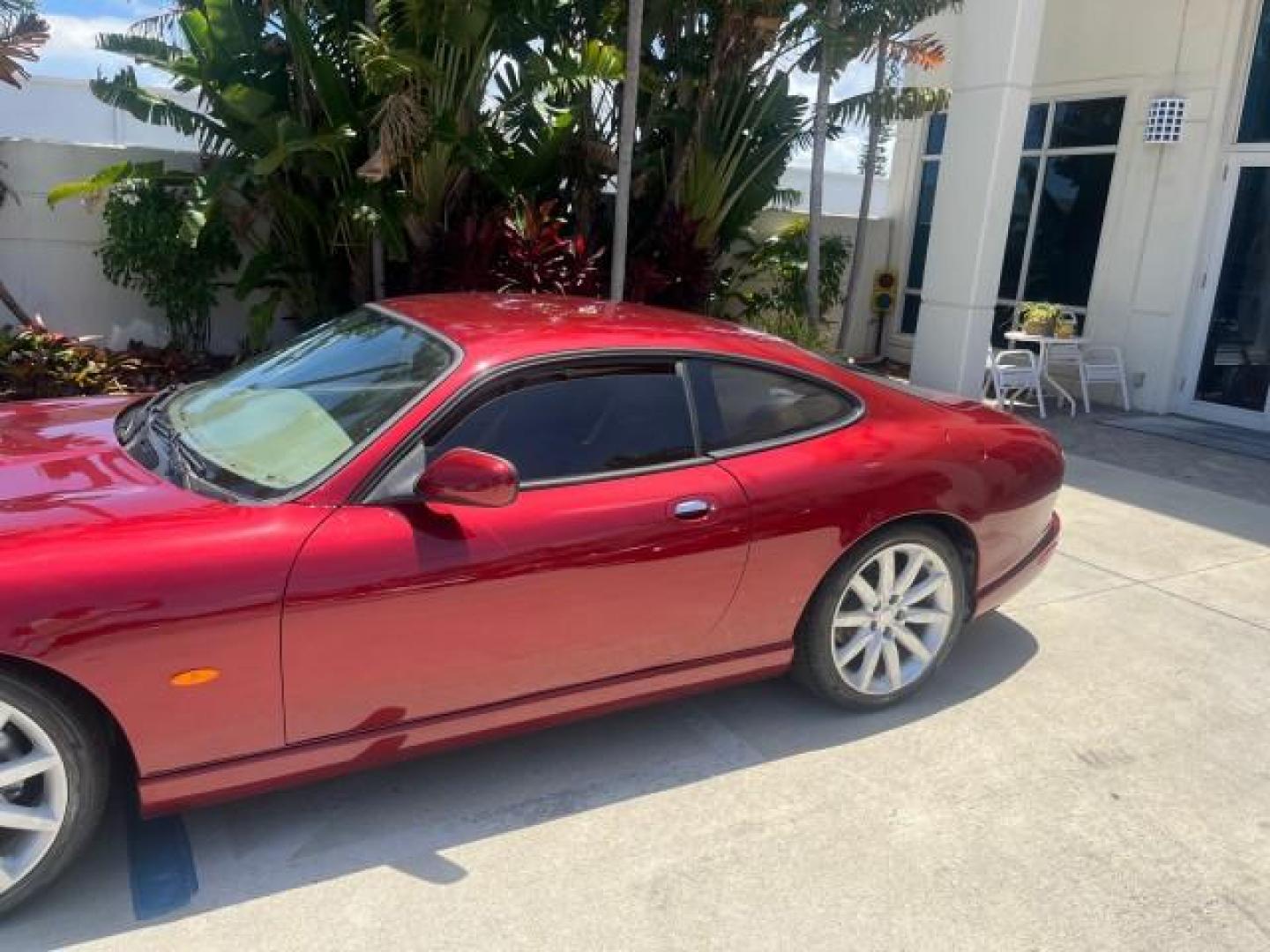 2005 Radiance /Ivory Jaguar XK8 XK8 COUPE LOW MILES 67,921 (SAJDA41C652) with an 4.2L DOHC EFI 32-Valve Aluminum Alloy V8 Engine engine, Automatic transmission, located at 4701 North Dixie Hwy, Pompano Beach, FL, 33064, (954) 422-2889, 26.240938, -80.123474 - OUR WEBPAGE FLORIDACARS1.COM HAS OVER 100 PHOTOS AND FREE CARFAX LINK 2005 JAGUAR XK-SERIES XK8 NEW $73,230 ROAD READY VIN: SAJDA41C652A41179 NO ACCIDENTS NO RECALLS COUPE FLORIDA OWNER 4.2L V8 4.2L V8 F DOHC LOW MILES 67,921 GASOLINE HEATED MIRRORS POWER HEATED LEATHER SEATS REAR WHEEL DRIVE PARKIN - Photo#71