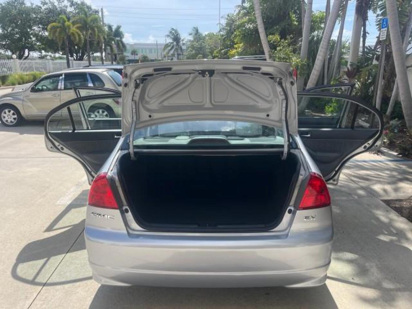 2004 Satin Silver Metallic /Gray Honda Civic EX LOW MILES 32,118 (2HGES26834H) with an 1.7L SOHC MPFI 16-Valve VTEC I4 Engine engine, Automatic transmission, located at 4701 North Dixie Hwy, Pompano Beach, FL, 33064, (954) 422-2889, 26.240938, -80.123474 - 2004 HONDA CIVIC EX ROAD READY 1.7L I4 VIN: 2HGES26834H541264 NO RECALLS 38 MPG SEDAN 4 DR 1 OWNER LOW MILES 31,118 1.7L I4 F SOHC POWER SUNROOF GASOLINE POWER MIRRORS FRONT WHEEL DRIVE 18 SERVICE RECORDS Alloy Wheels Approach Lights Cruise Control FWD Front Bucket Seats Moonroof / Sunroof THIS IS O - Photo#15