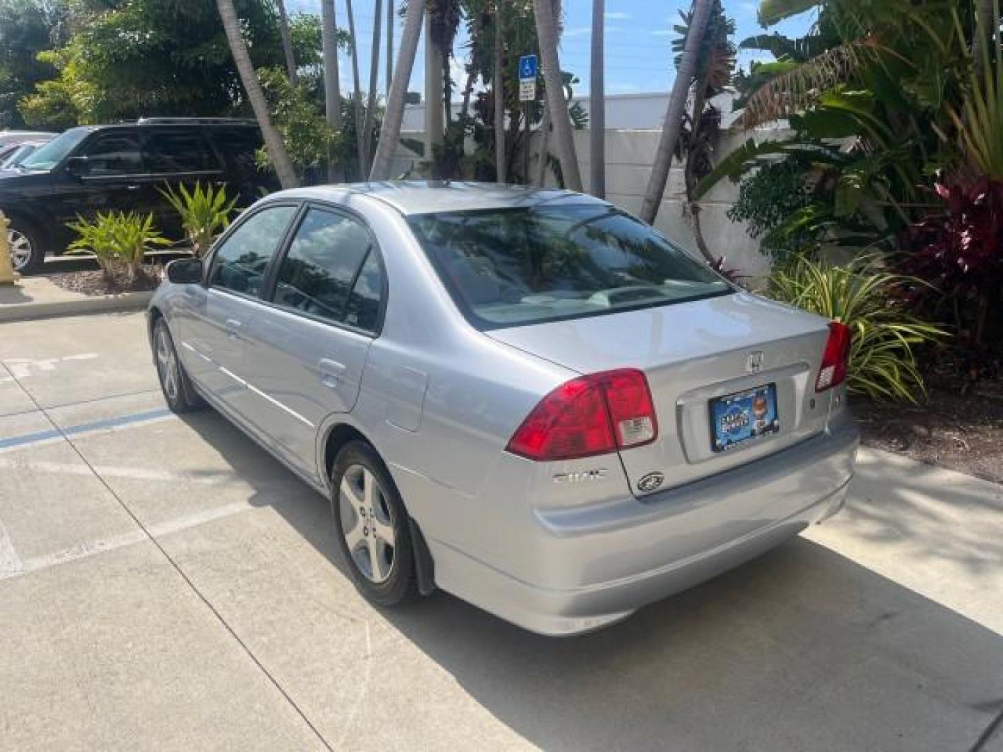 2004 Satin Silver Metallic /Gray Honda Civic EX LOW MILES 32,118 (2HGES26834H) with an 1.7L SOHC MPFI 16-Valve VTEC I4 Engine engine, Automatic transmission, located at 4701 North Dixie Hwy, Pompano Beach, FL, 33064, (954) 422-2889, 26.240938, -80.123474 - 2004 HONDA CIVIC EX ROAD READY 1.7L I4 VIN: 2HGES26834H541264 NO RECALLS 38 MPG SEDAN 4 DR 1 OWNER LOW MILES 31,118 1.7L I4 F SOHC POWER SUNROOF GASOLINE POWER MIRRORS FRONT WHEEL DRIVE 18 SERVICE RECORDS Alloy Wheels Approach Lights Cruise Control FWD Front Bucket Seats Moonroof / Sunroof THIS IS O - Photo#5