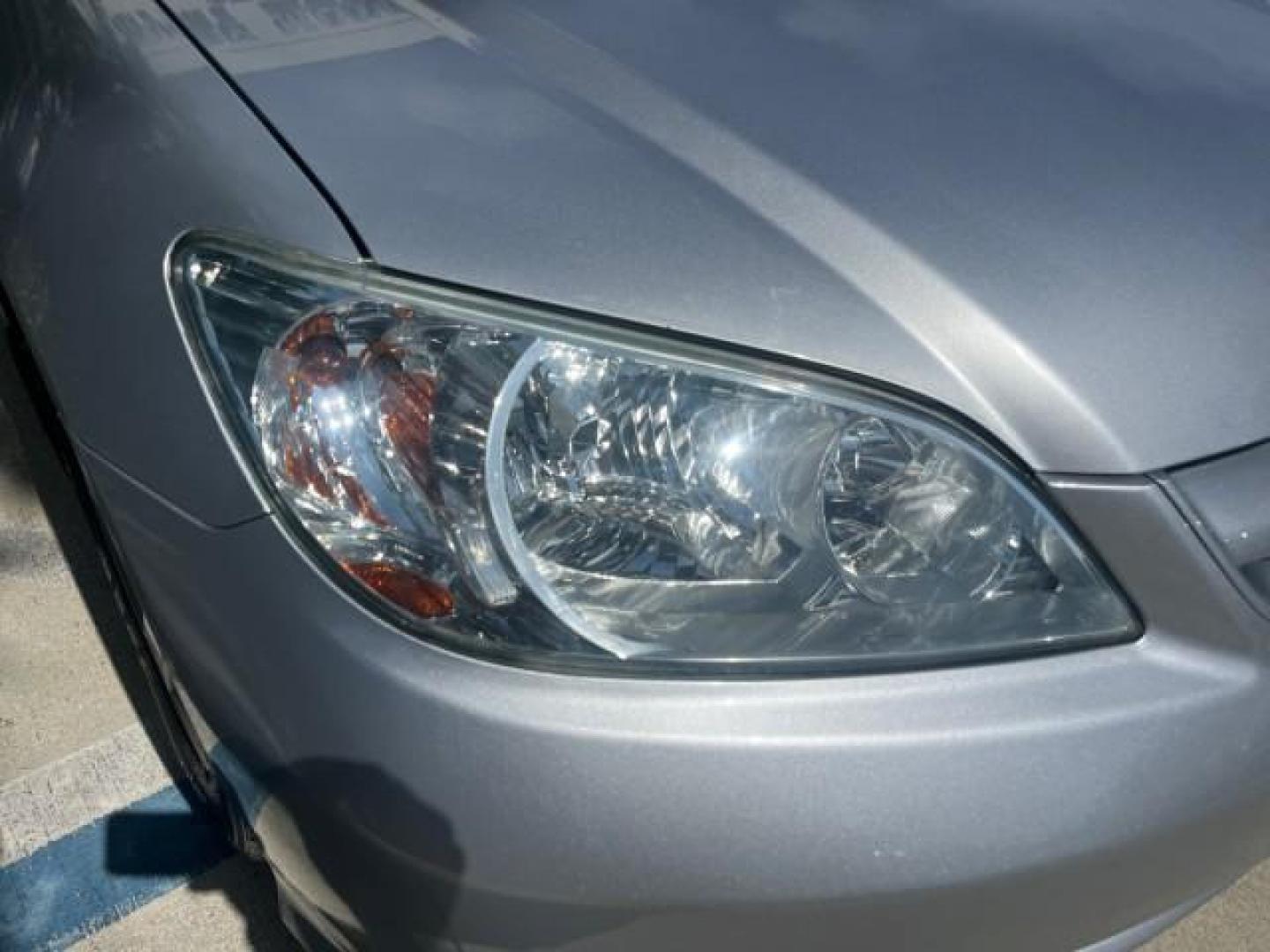 2004 Satin Silver Metallic /Gray Honda Civic EX LOW MILES 32,118 (2HGES26834H) with an 1.7L SOHC MPFI 16-Valve VTEC I4 Engine engine, Automatic transmission, located at 4701 North Dixie Hwy, Pompano Beach, FL, 33064, (954) 422-2889, 26.240938, -80.123474 - 2004 HONDA CIVIC EX ROAD READY 1.7L I4 VIN: 2HGES26834H541264 NO RECALLS 38 MPG SEDAN 4 DR 1 OWNER LOW MILES 31,118 1.7L I4 F SOHC POWER SUNROOF GASOLINE POWER MIRRORS FRONT WHEEL DRIVE 18 SERVICE RECORDS Alloy Wheels Approach Lights Cruise Control FWD Front Bucket Seats Moonroof / Sunroof THIS IS O - Photo#71