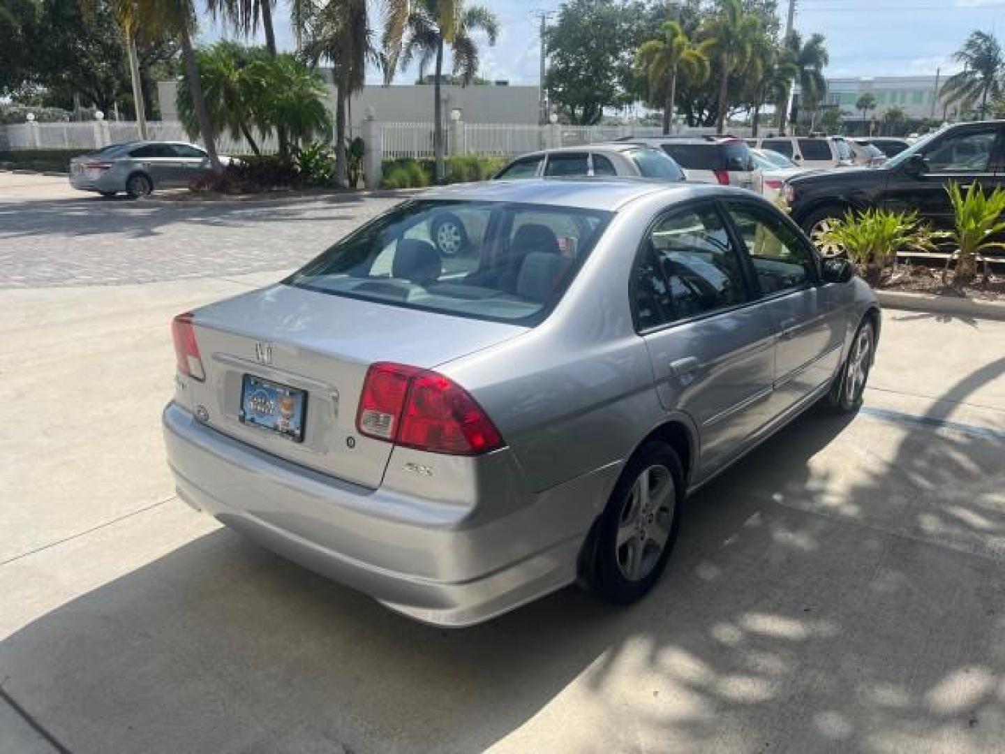 2004 Satin Silver Metallic /Gray Honda Civic EX LOW MILES 32,118 (2HGES26834H) with an 1.7L SOHC MPFI 16-Valve VTEC I4 Engine engine, Automatic transmission, located at 4701 North Dixie Hwy, Pompano Beach, FL, 33064, (954) 422-2889, 26.240938, -80.123474 - 2004 HONDA CIVIC EX ROAD READY 1.7L I4 VIN: 2HGES26834H541264 NO RECALLS 38 MPG SEDAN 4 DR 1 OWNER LOW MILES 31,118 1.7L I4 F SOHC POWER SUNROOF GASOLINE POWER MIRRORS FRONT WHEEL DRIVE 18 SERVICE RECORDS Alloy Wheels Approach Lights Cruise Control FWD Front Bucket Seats Moonroof / Sunroof THIS IS O - Photo#7