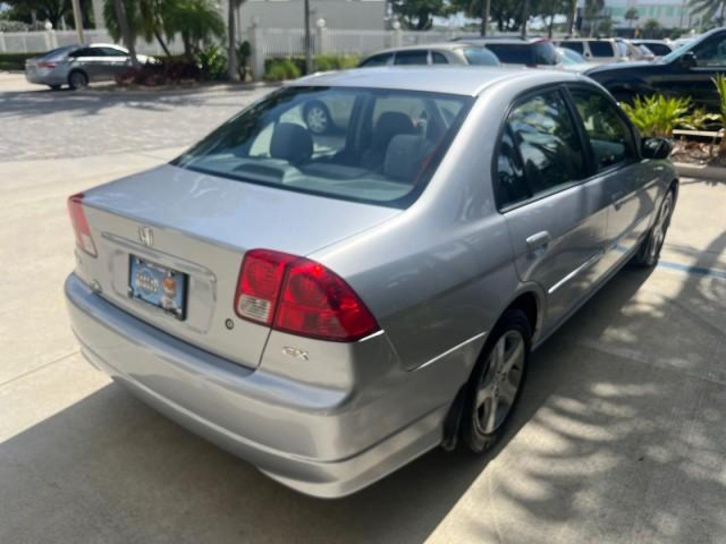 2004 Satin Silver Metallic /Gray Honda Civic EX LOW MILES 32,118 (2HGES26834H) with an 1.7L SOHC MPFI 16-Valve VTEC I4 Engine engine, Automatic transmission, located at 4701 North Dixie Hwy, Pompano Beach, FL, 33064, (954) 422-2889, 26.240938, -80.123474 - 2004 HONDA CIVIC EX ROAD READY 1.7L I4 VIN: 2HGES26834H541264 NO RECALLS 38 MPG SEDAN 4 DR 1 OWNER LOW MILES 31,118 1.7L I4 F SOHC POWER SUNROOF GASOLINE POWER MIRRORS FRONT WHEEL DRIVE 18 SERVICE RECORDS Alloy Wheels Approach Lights Cruise Control FWD Front Bucket Seats Moonroof / Sunroof THIS IS O - Photo#91