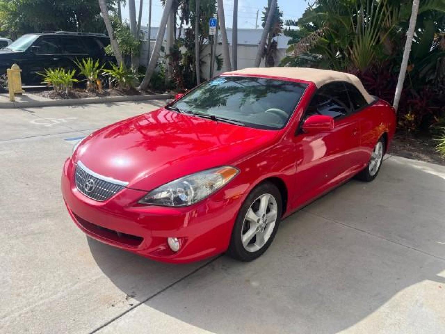 2005 Absolutely Red /Ivory Toyota Camry Solara SLE LOW MILES 30,937 (4T1FA38P95U) with an 3.3L DOHC SEFI VVT-i 24-Valve V6 Engine engine, Automatic transmission, located at 4701 North Dixie Hwy, Pompano Beach, FL, 33064, (954) 422-2889, 26.240938, -80.123474 - OUR WEBPAGE FLORIDACARS1.COM HAS OVER 100 PHOTOS AND FREE CARFAX LINK 2005 TOYOTA CAMRY SOLARA SE V6 ROAD READY 3.3L V6 VIN: 4T1FA38P95U061434 NO RECALLS 29 MPG CONVERTIBLE POWER CONVERTIBLE TOP 3.3L V6 F DOHC 24V POWER LEATHER SEATS GASOLINE FLORIDA OWNER FRONT WHEEL DRIVE LOW MILES 30,937 Alloy Wh - Photo#3